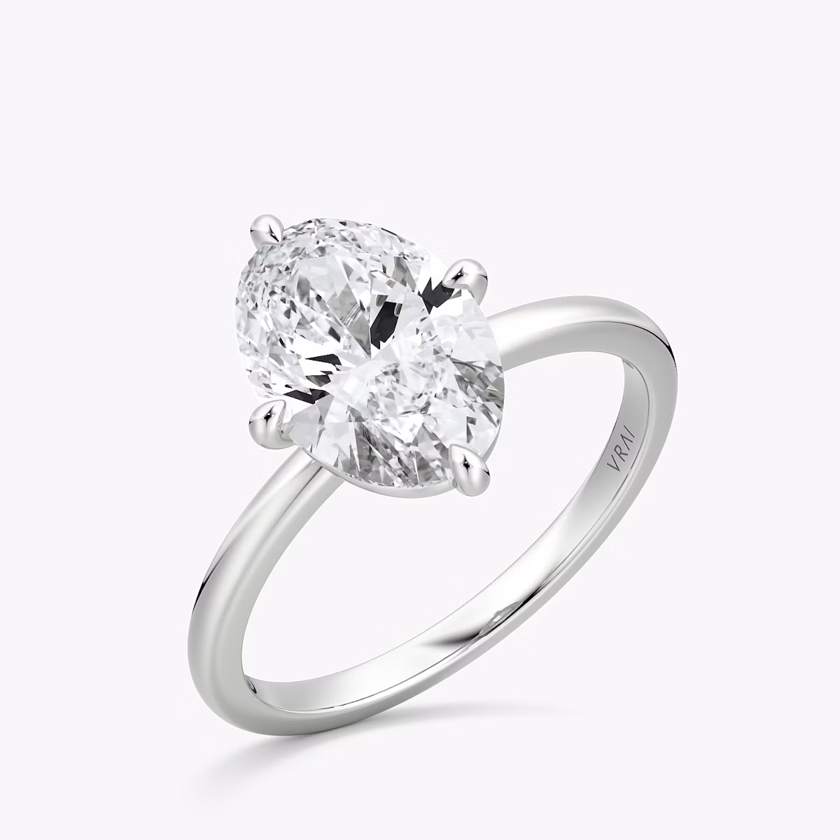 The Compass Solitaire | Oval | Platinum | bandAccent: Plain | diamondOrientation: vertical | caratWeight: other