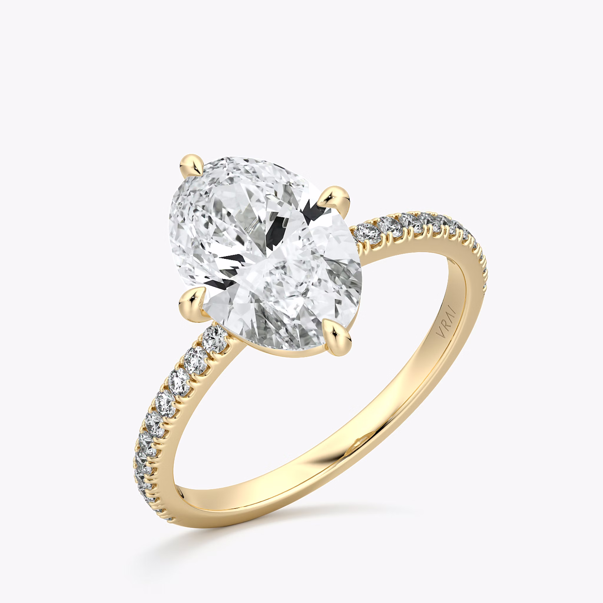 The Compass Solitaire | Oval | 18k | Yellow Gold | bandAccent: Pavé | diamondOrientation: vertical | caratWeight: other