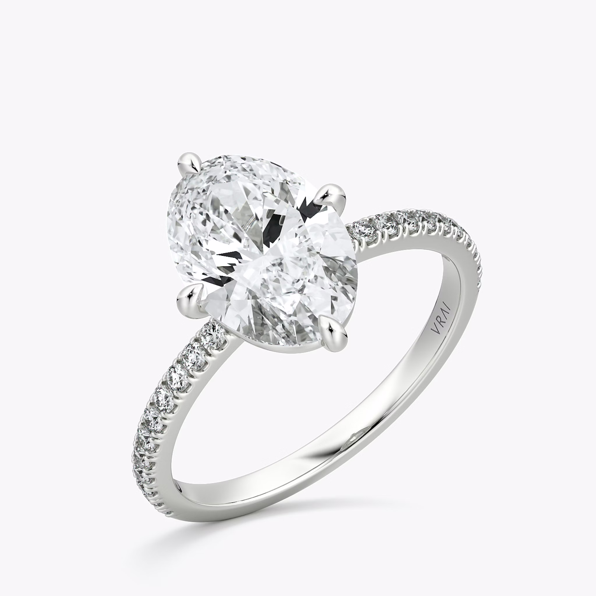 The Compass Solitaire | Oval | 18k | White Gold | bandAccent: Pavé | diamondOrientation: vertical | caratWeight: other