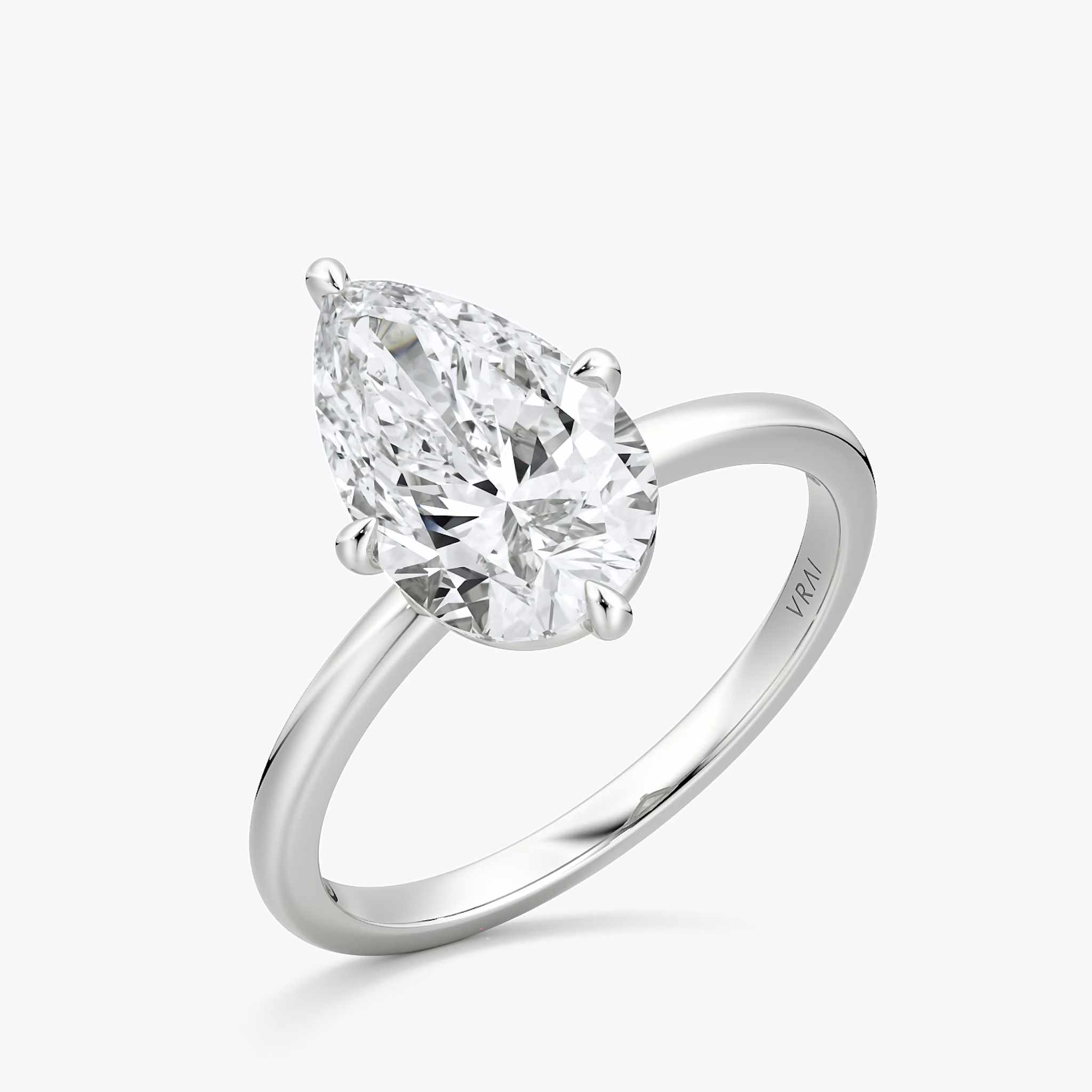 The Compass Solitaire | Pear | 18k | White Gold | bandAccent: Plain | diamondOrientation: vertical | caratWeight: other