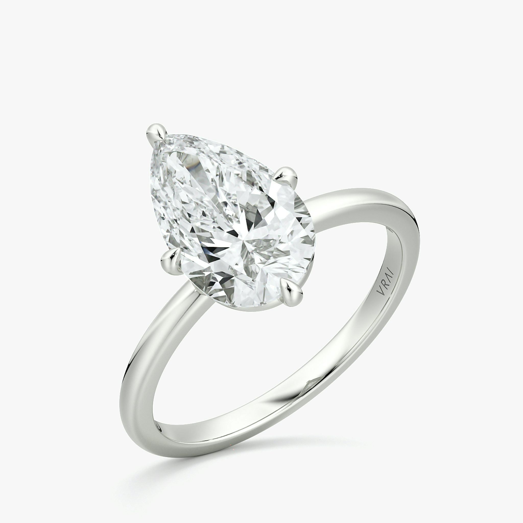 The Compass Solitaire | Pear | 18k | White Gold | bandAccent: Plain | diamondOrientation: vertical | caratWeight: other