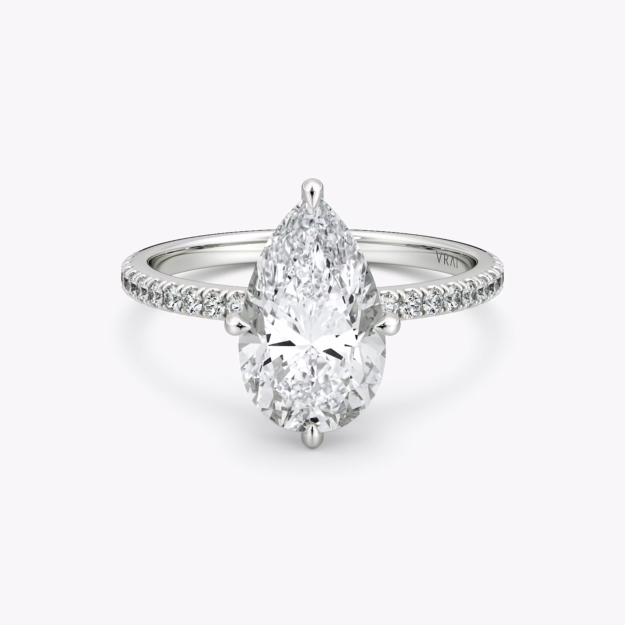 The Compass Solitaire | Pear | 18k | White Gold | bandAccent: Pavé | diamondOrientation: vertical | caratWeight: other