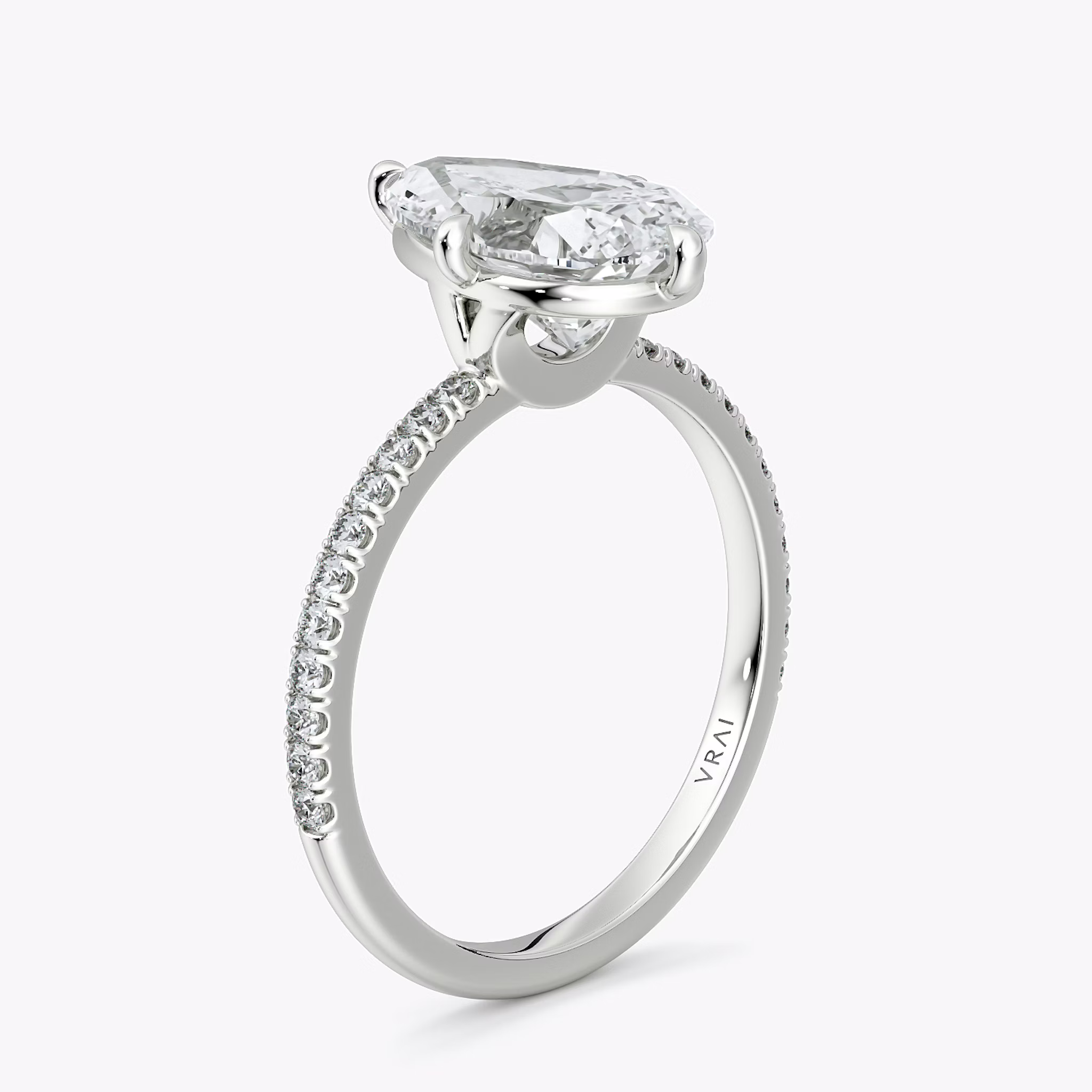 The Compass Solitaire | Pear | 18k | White Gold | bandAccent: Pavé | diamondOrientation: vertical | caratWeight: other