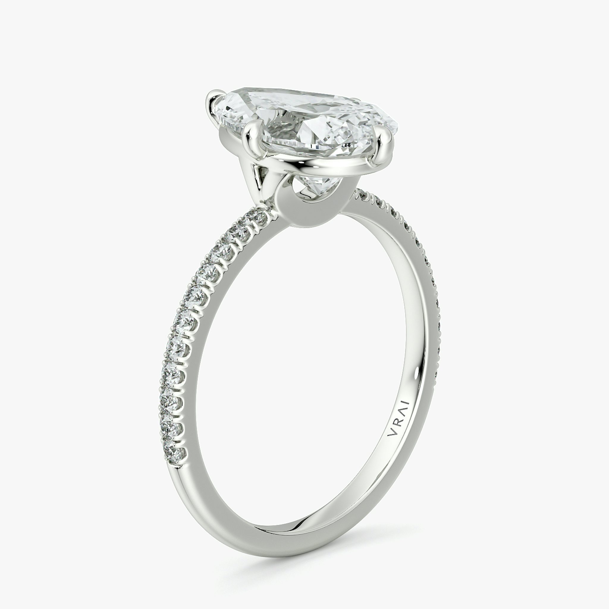 The Compass Solitaire | Pear | 18k | White Gold | bandAccent: Pavé | diamondOrientation: vertical | caratWeight: other