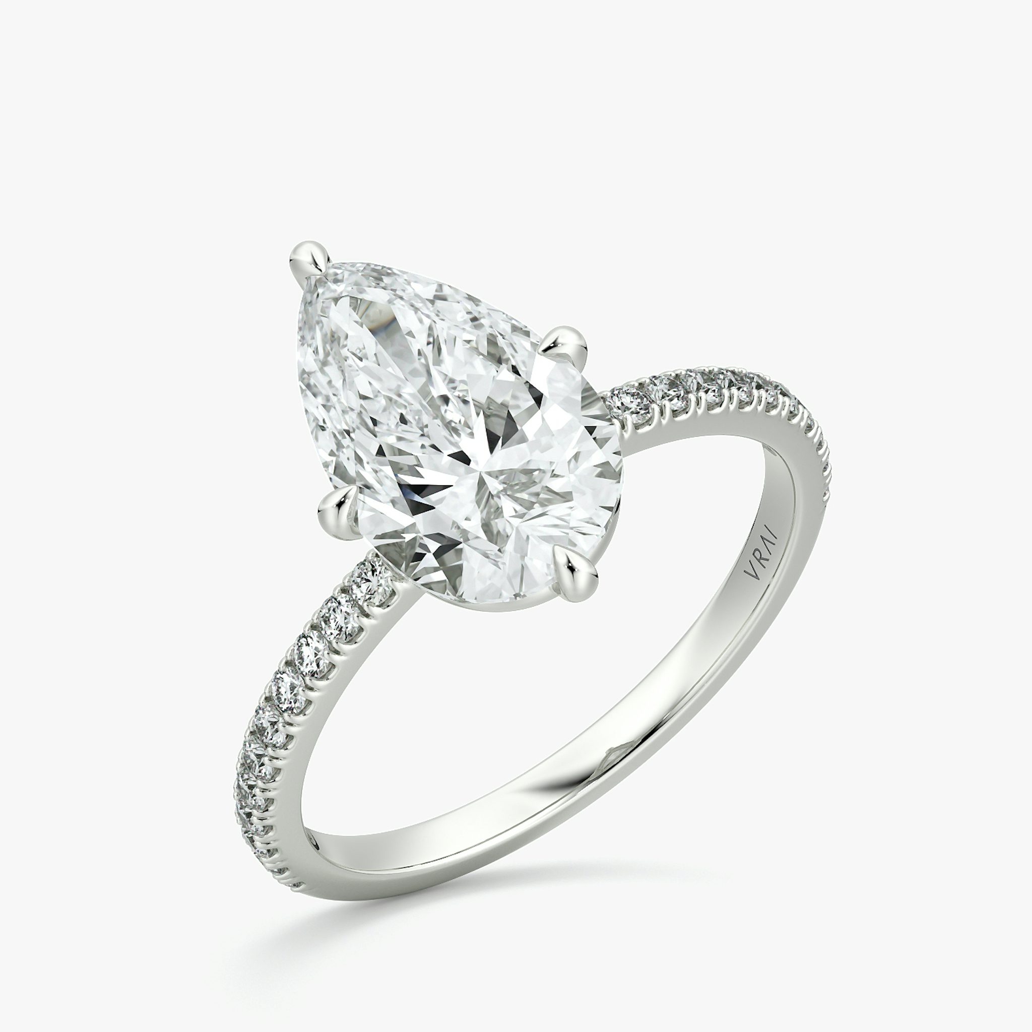 The Compass Solitaire | Pear | 18k | White Gold | bandAccent: Pavé | diamondOrientation: vertical | caratWeight: other
