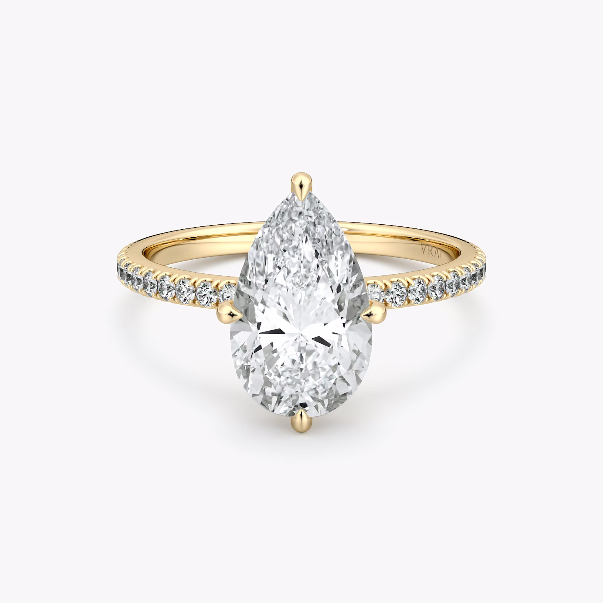 The Compass Solitaire | Pear | 18k | Yellow Gold | bandAccent: Pavé | diamondOrientation: vertical | caratWeight: other