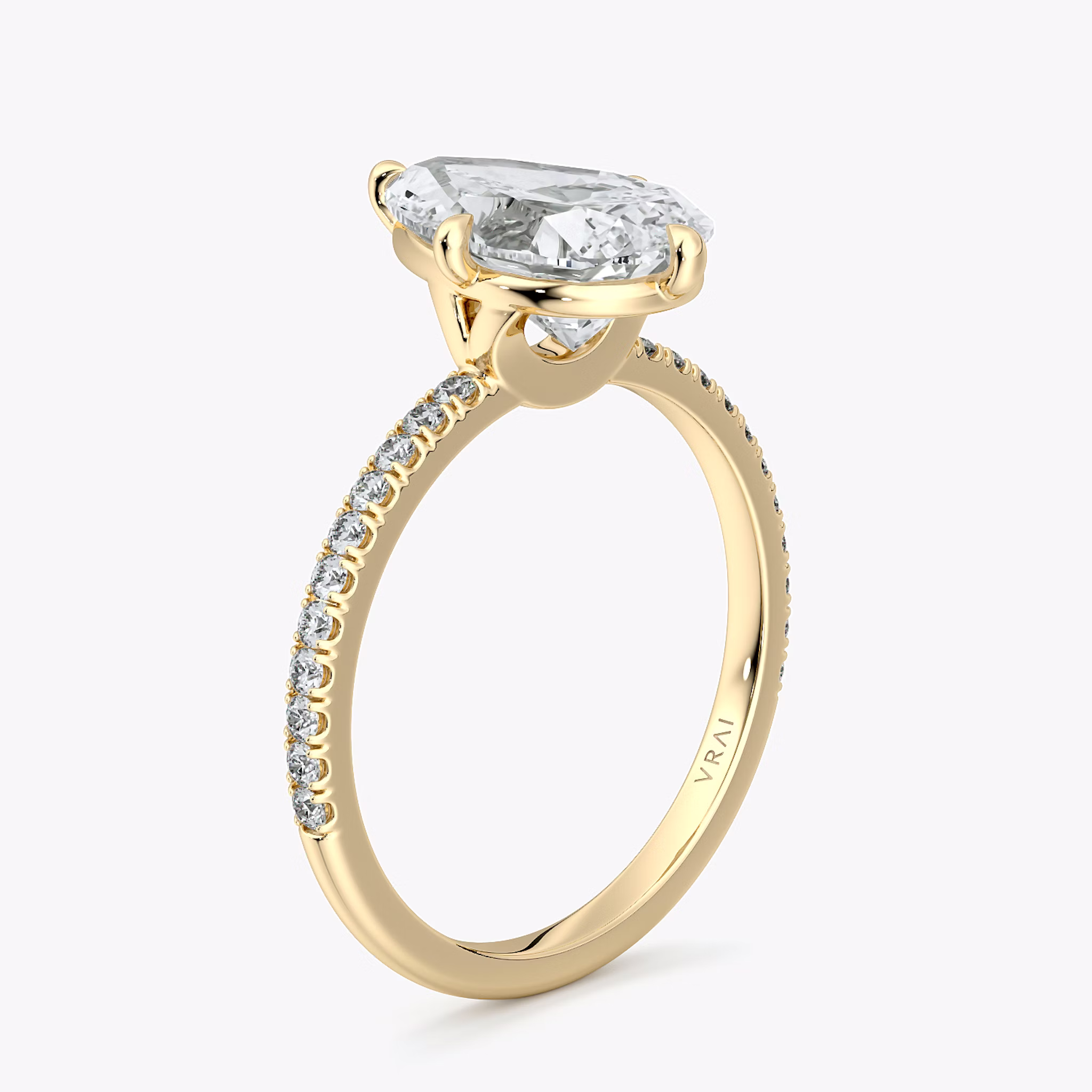 The Compass Solitaire | Pear | 18k | Yellow Gold | bandAccent: Pavé | diamondOrientation: vertical | caratWeight: other