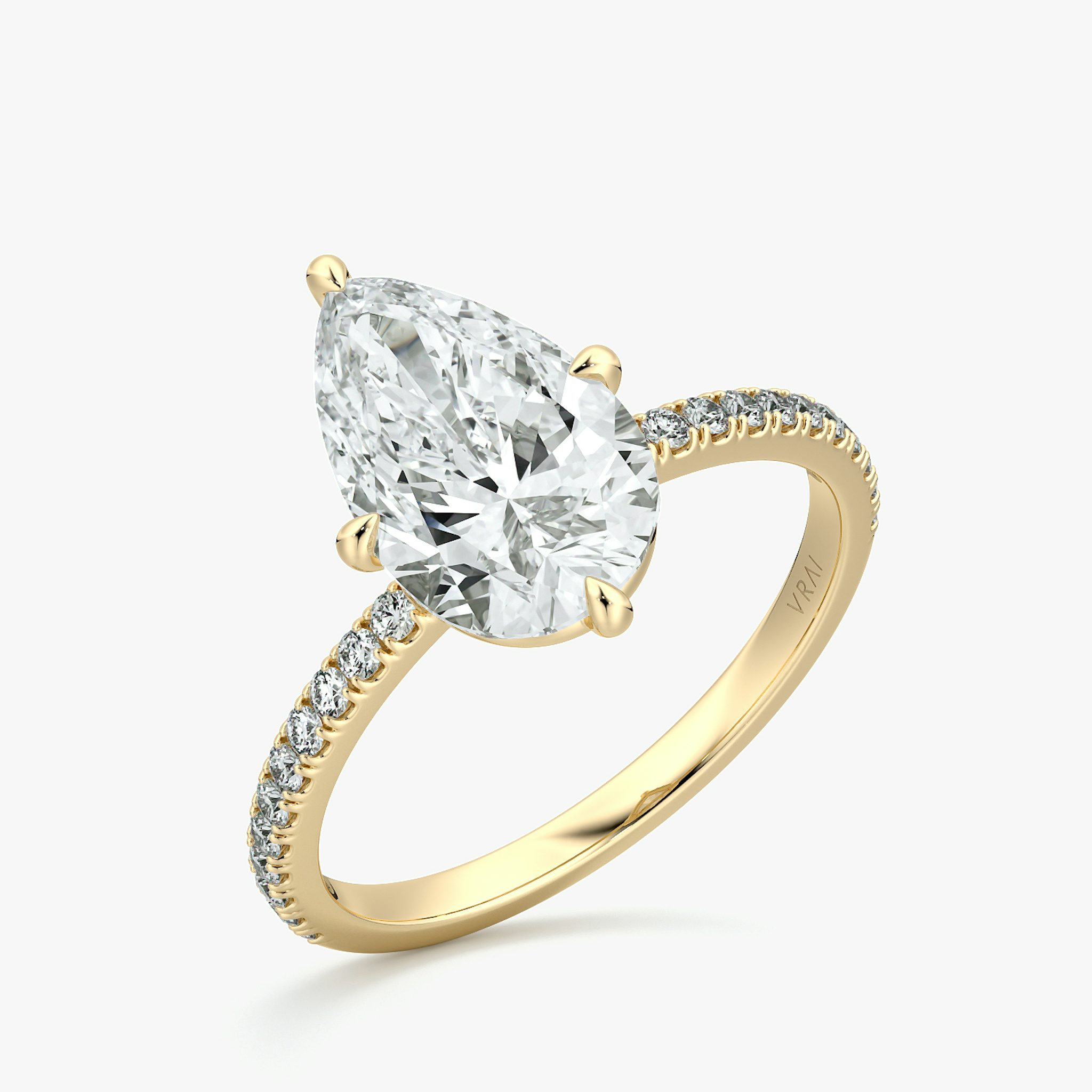 The Compass Solitaire | Pear | 18k | Yellow Gold | bandAccent: Pavé | diamondOrientation: vertical | caratWeight: other
