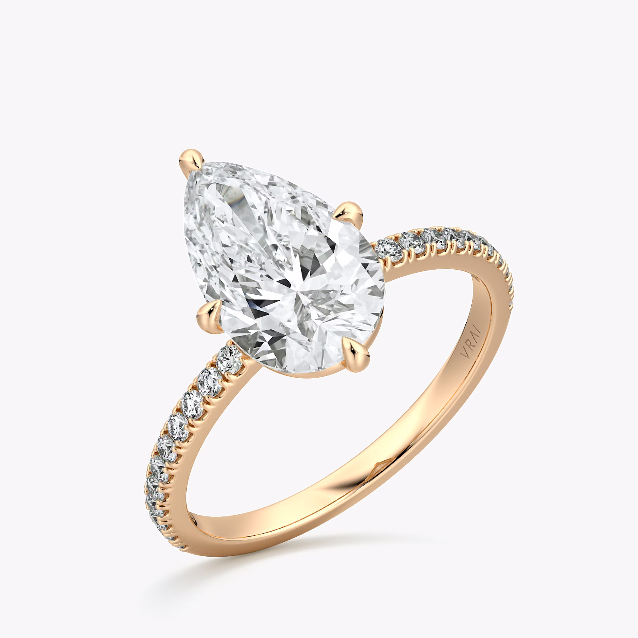 The Compass Solitaire | Pear | 14k | Rose Gold | bandAccent: Pavé | diamondOrientation: vertical | caratWeight: other