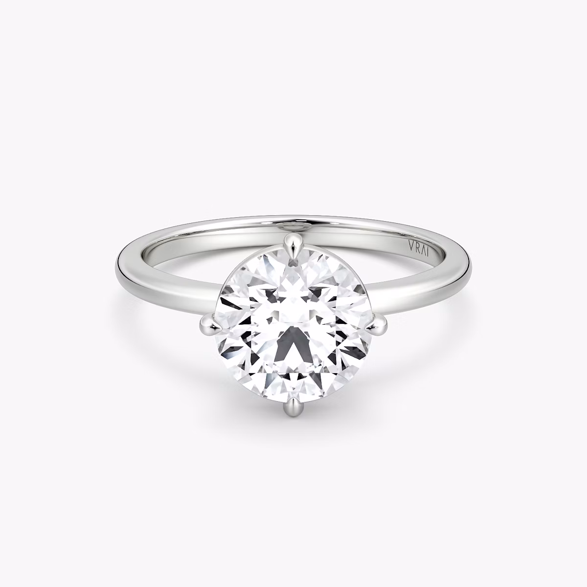 The Compass Solitaire | Round Brilliant | 18k | White Gold | bandAccent: Plain | caratWeight: 1.5ct | diamondOrientation: vertical