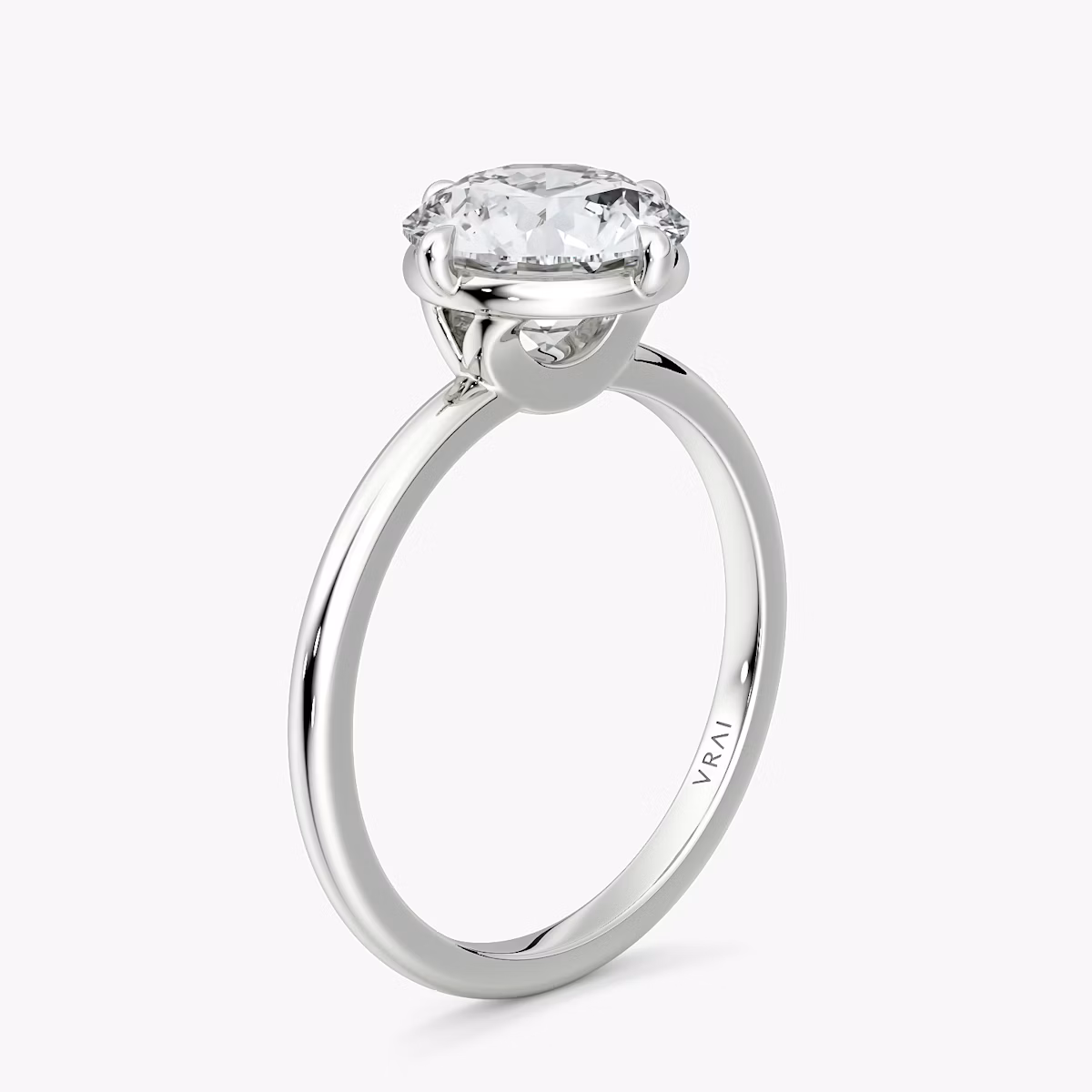 The Compass Solitaire | Round Brilliant | 18k | White Gold | bandAccent: Plain | caratWeight: 1.5ct | diamondOrientation: vertical