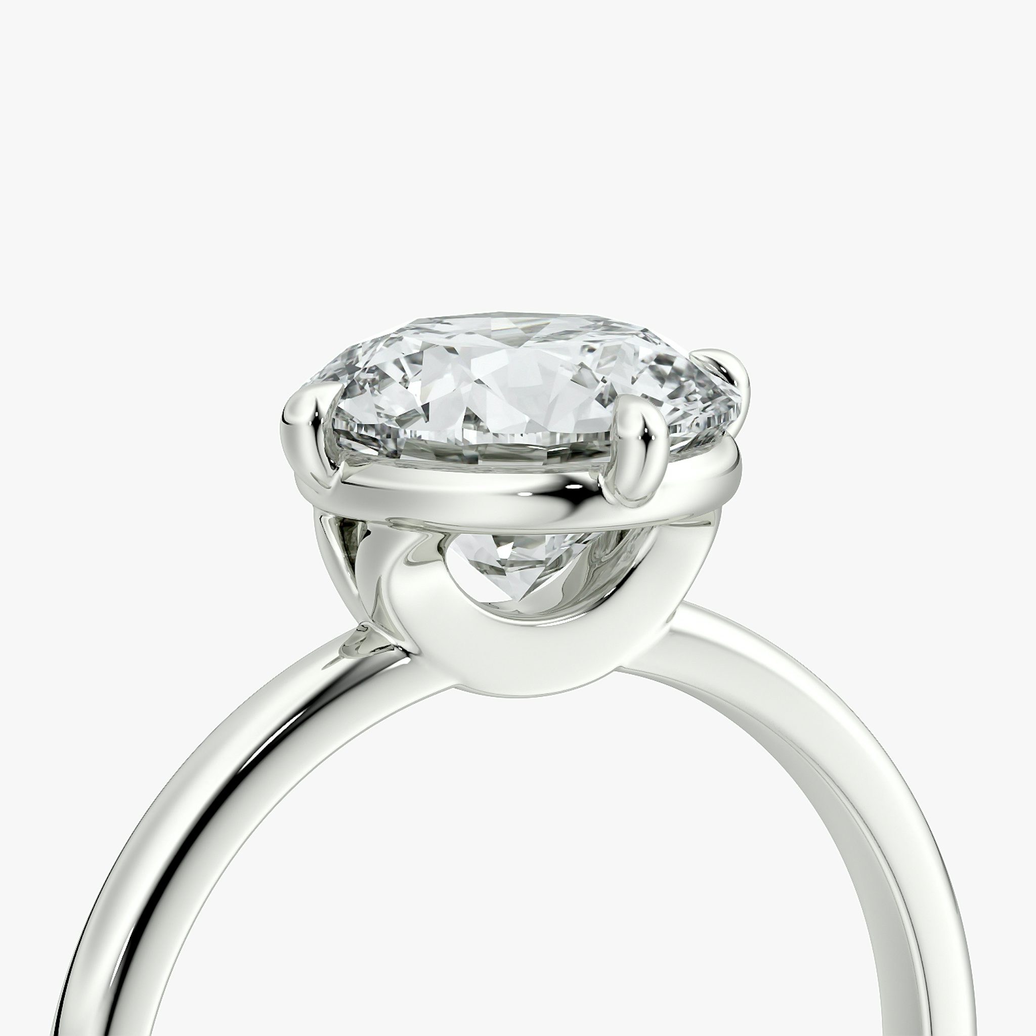 The Compass Solitaire | Round Brilliant | Platinum | bandAccent: Plain | caratWeight: other | diamondOrientation: vertical