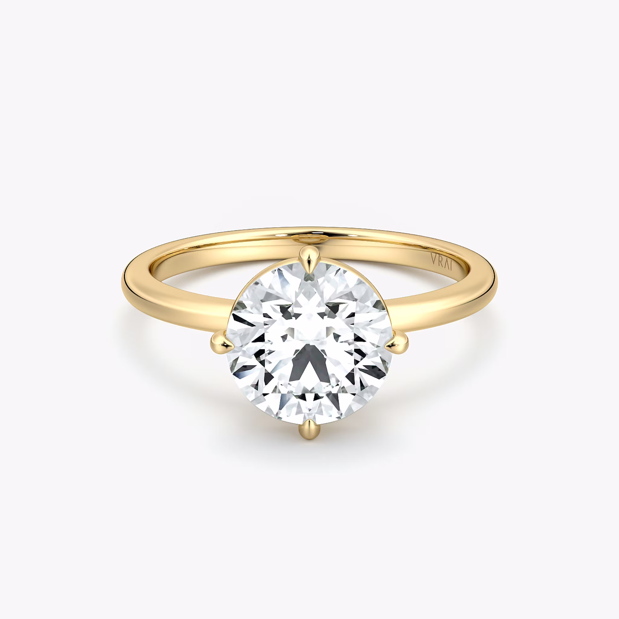 The Compass Solitaire Round Brilliant | Yellow Gold