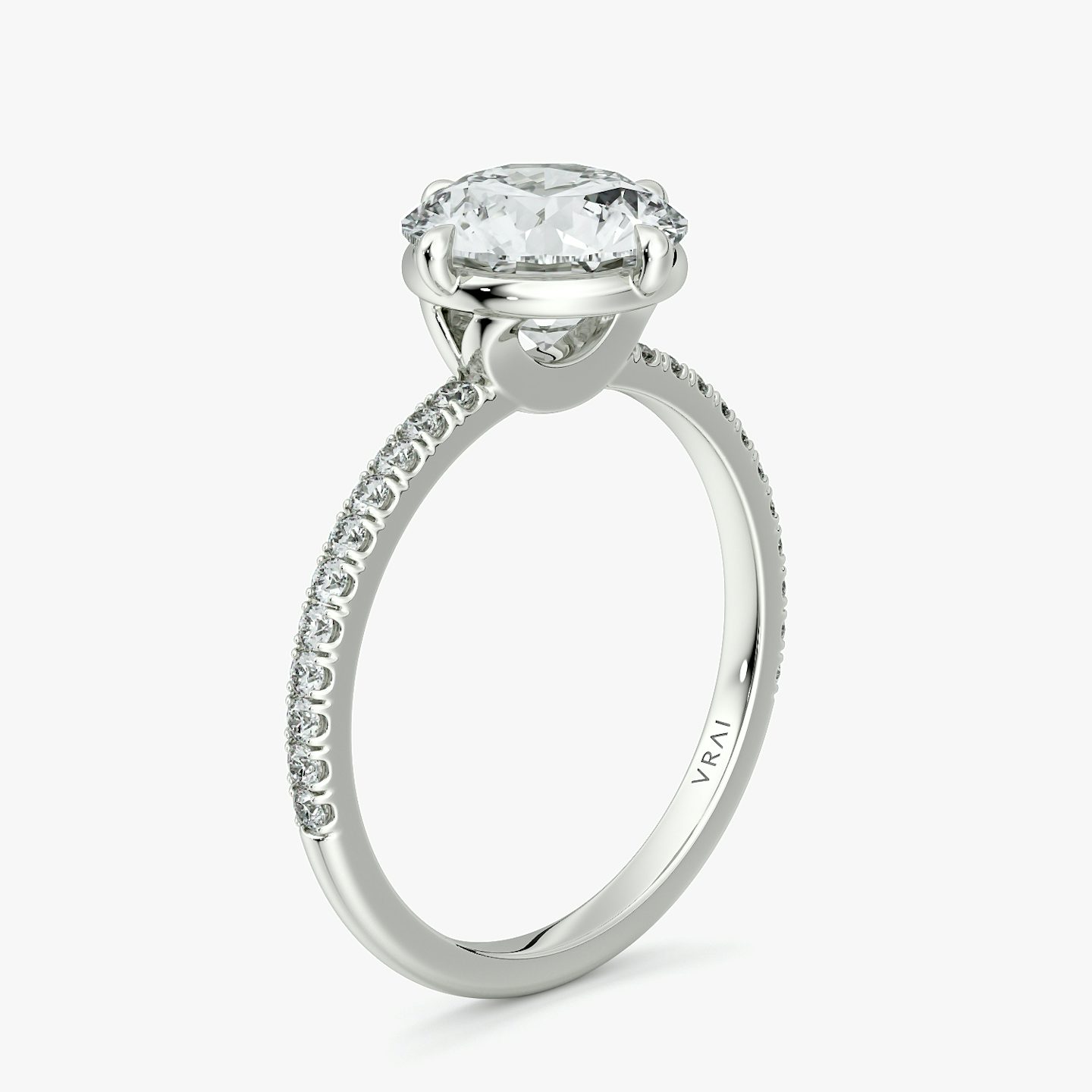 The Compass Solitaire | Round Brilliant | Platinum | bandAccent: Pavé | caratWeight: 1.0ct | diamondOrientation: vertical
