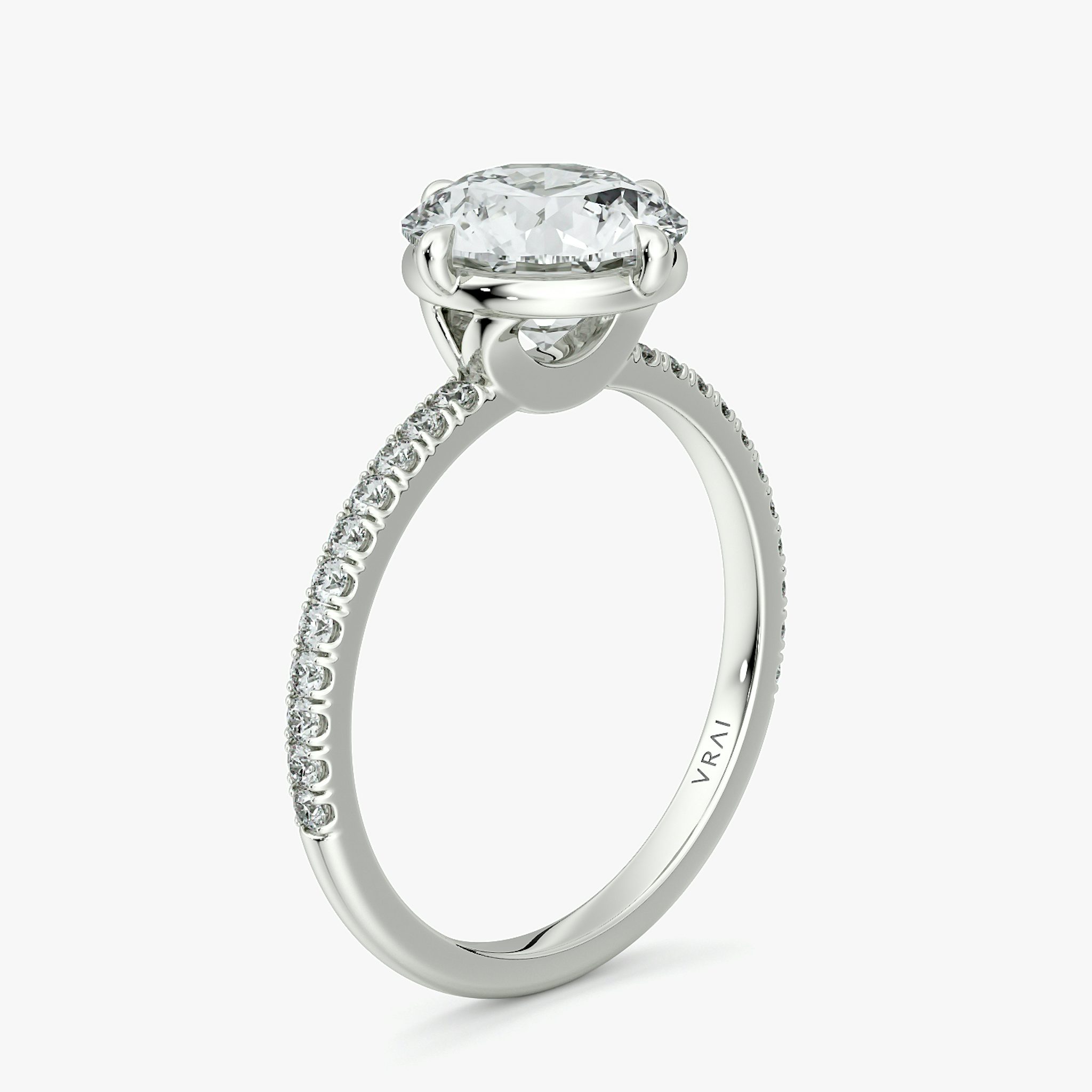 The Compass Solitaire | Round Brilliant | Platinum | bandAccent: Pavé | caratWeight: 2.0ct | diamondOrientation: vertical
