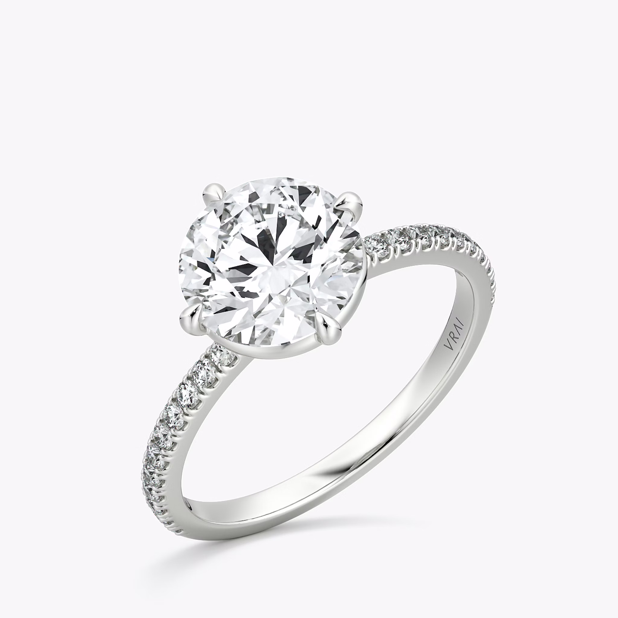 The Compass Solitaire | Round Brilliant | Platinum | bandAccent: Pavé | caratWeight: 2.0ct | diamondOrientation: vertical