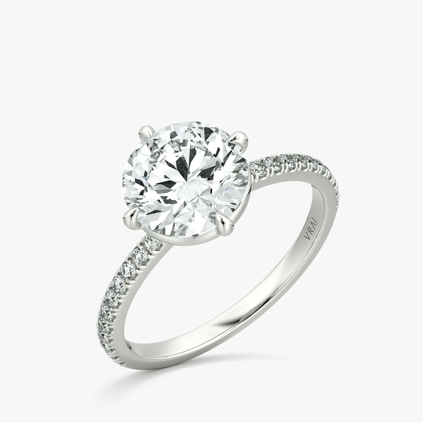 The Compass Solitaire | Round Brilliant | Platinum | bandAccent: Pavé | caratWeight: 1.0ct | diamondOrientation: vertical