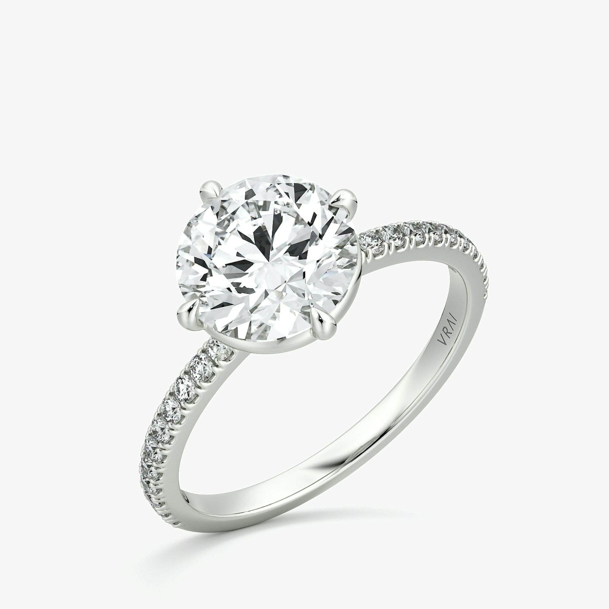 The Compass Solitaire | Round Brilliant | Platinum | bandAccent: Pavé | caratWeight: 2.0ct | diamondOrientation: vertical