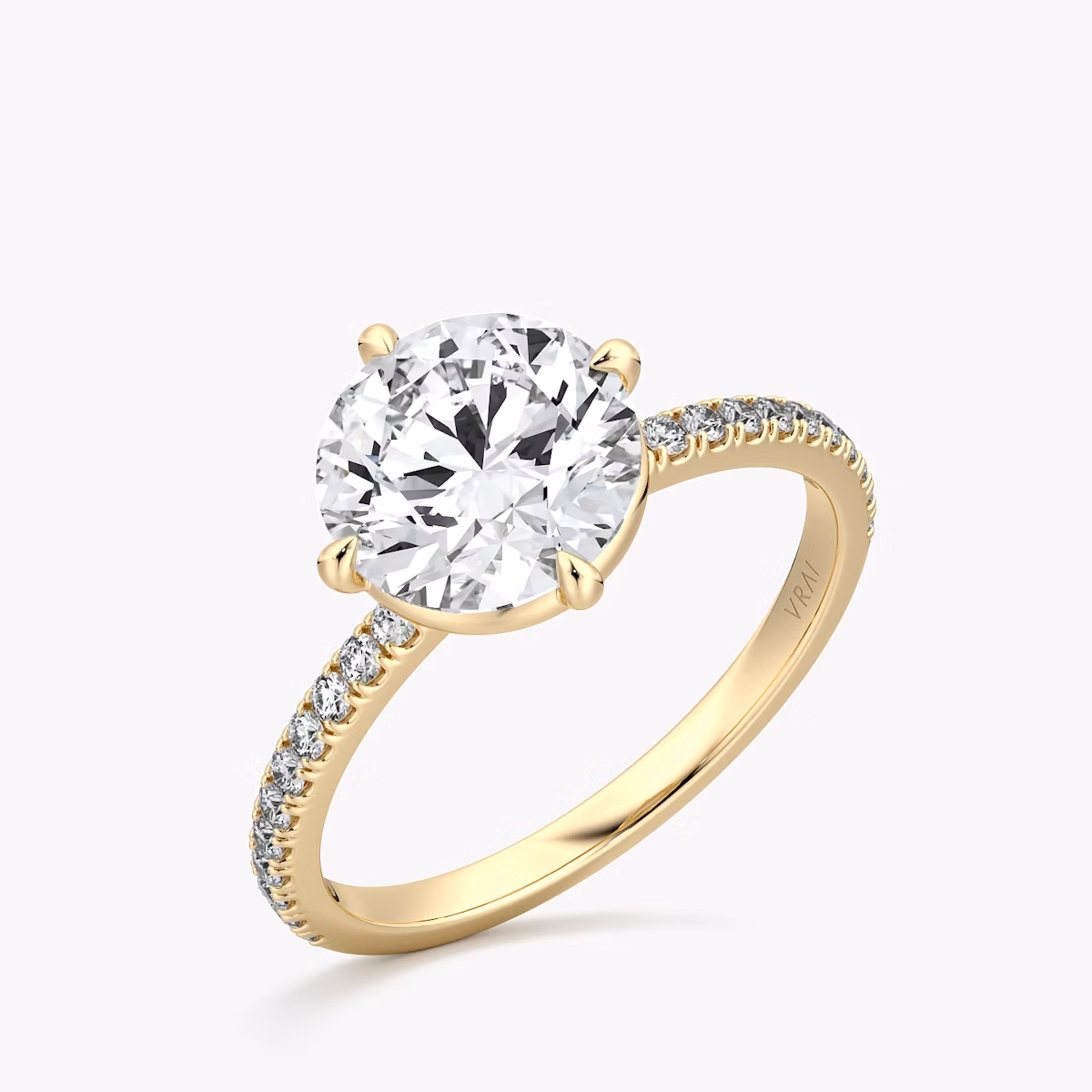 The Compass Solitaire | Round Brilliant | 18k | Yellow Gold | bandAccent: Pavé | caratWeight: 2.0ct | diamondOrientation: vertical