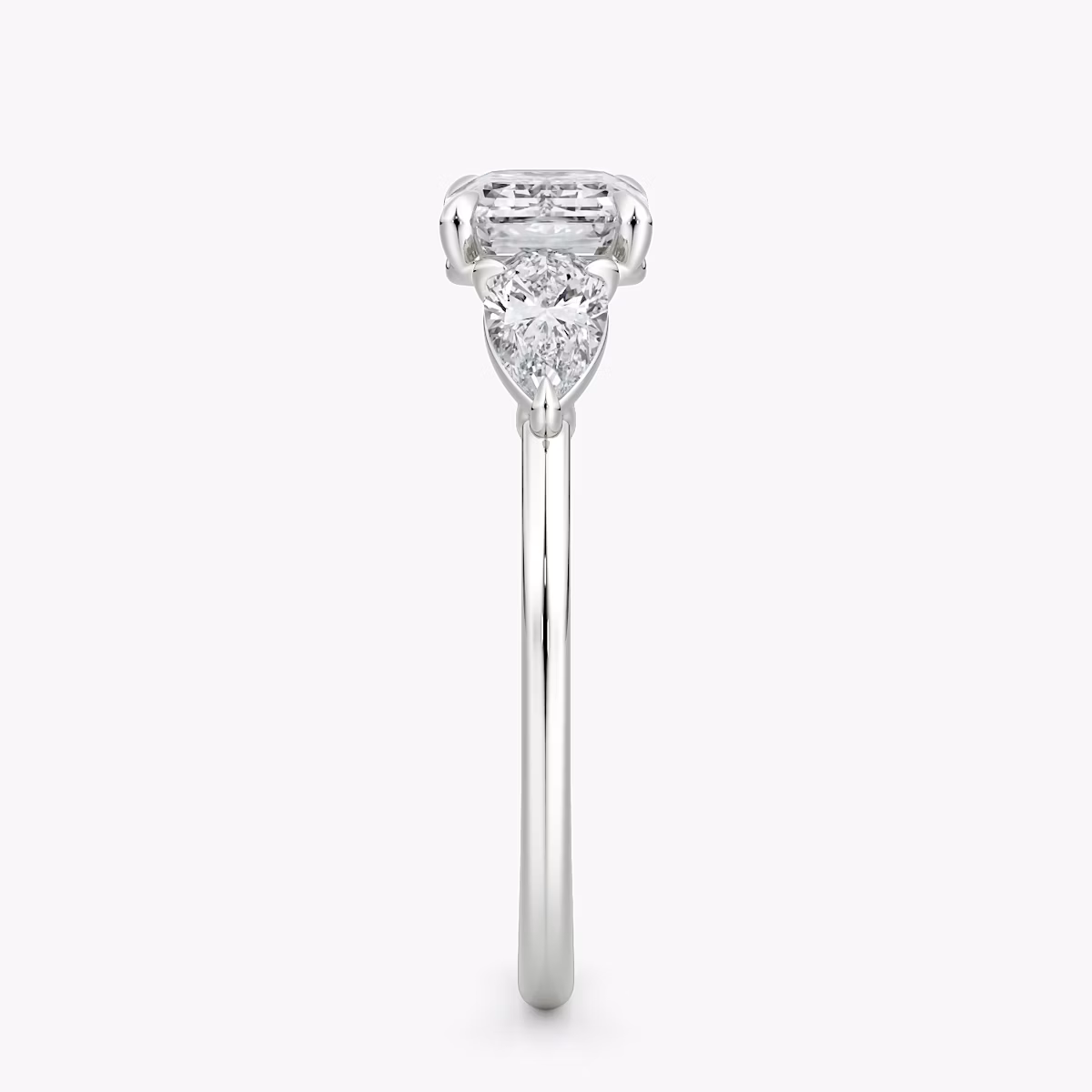 The Three Stone | Emerald | 18k | White Gold | bandAccent: Plain | diamondOrientation: horizontal | sideStoneCarat: 0.25ct | sideStoneShape: Pear | caratWeight: other