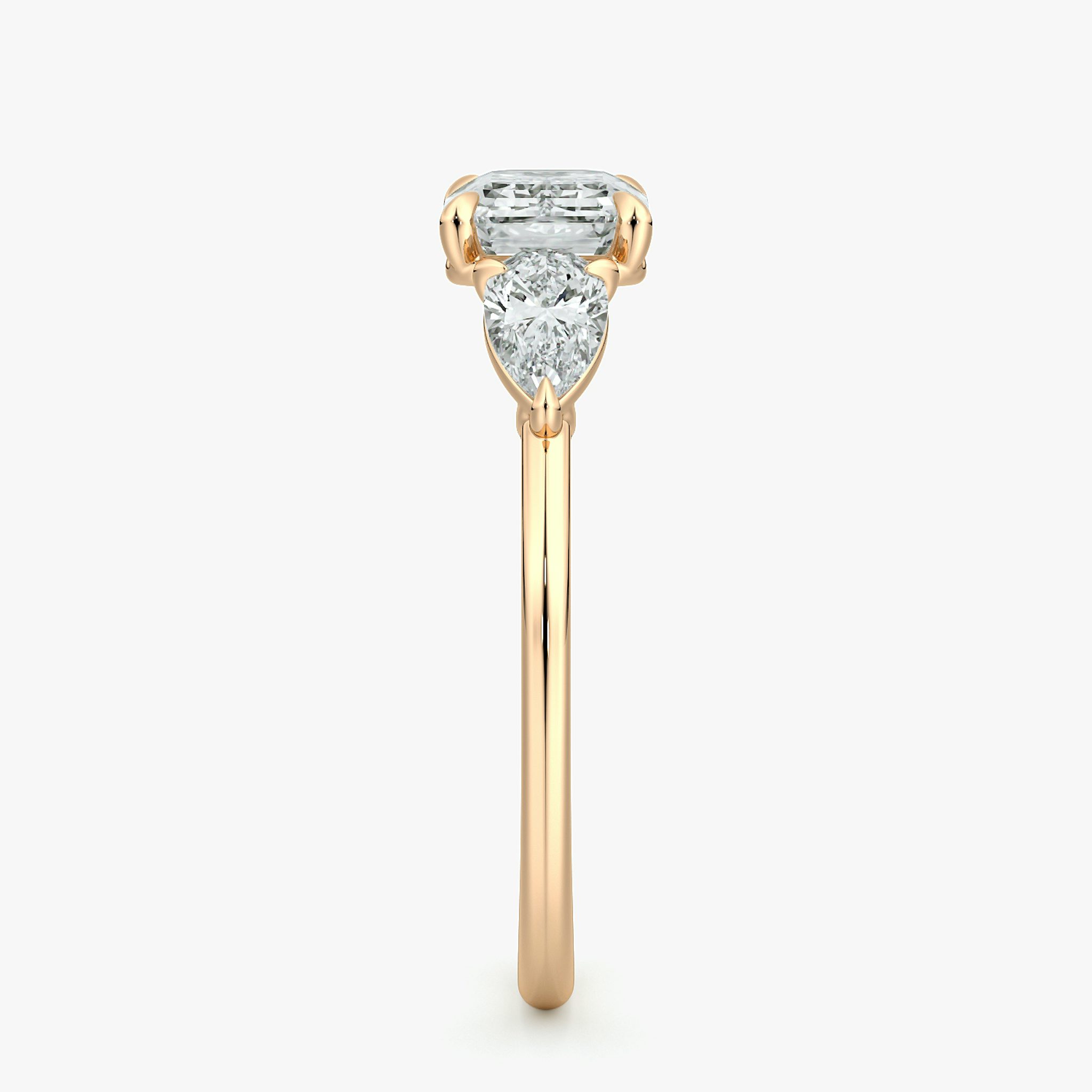 The Three Stone | Emerald | 14k | Rose Gold | bandAccent: Plain | diamondOrientation: horizontal | sideStoneCarat: 0.25ct | sideStoneShape: Pear | caratWeight: other