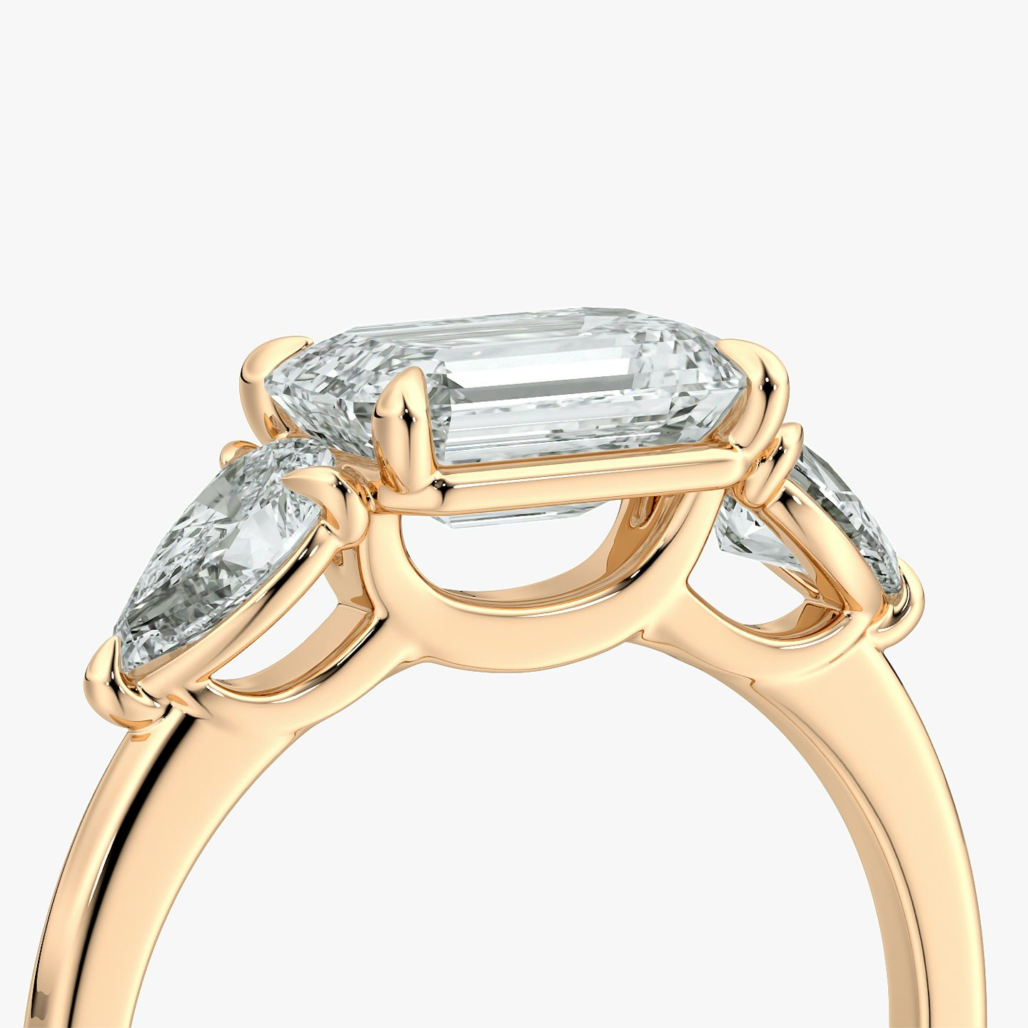 The Three Stone | Emerald | 14k | Rose Gold | bandAccent: Plain | diamondOrientation: horizontal | sideStoneCarat: 0.25ct | sideStoneShape: Pear | caratWeight: other