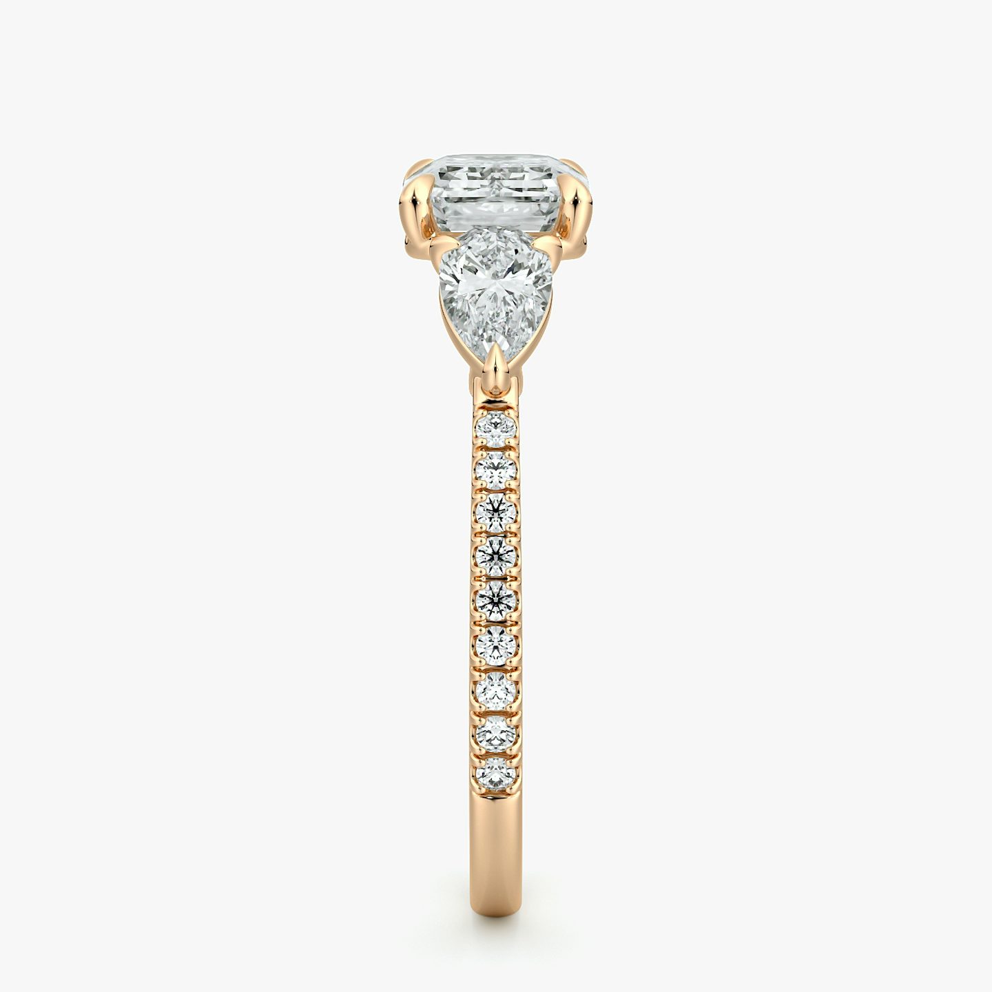 The Three Stone | Emerald | 14k | Rose Gold | bandAccent: Pavé | diamondOrientation: horizontal | sideStoneCarat: 0.25ct | sideStoneShape: Pear | caratWeight: other