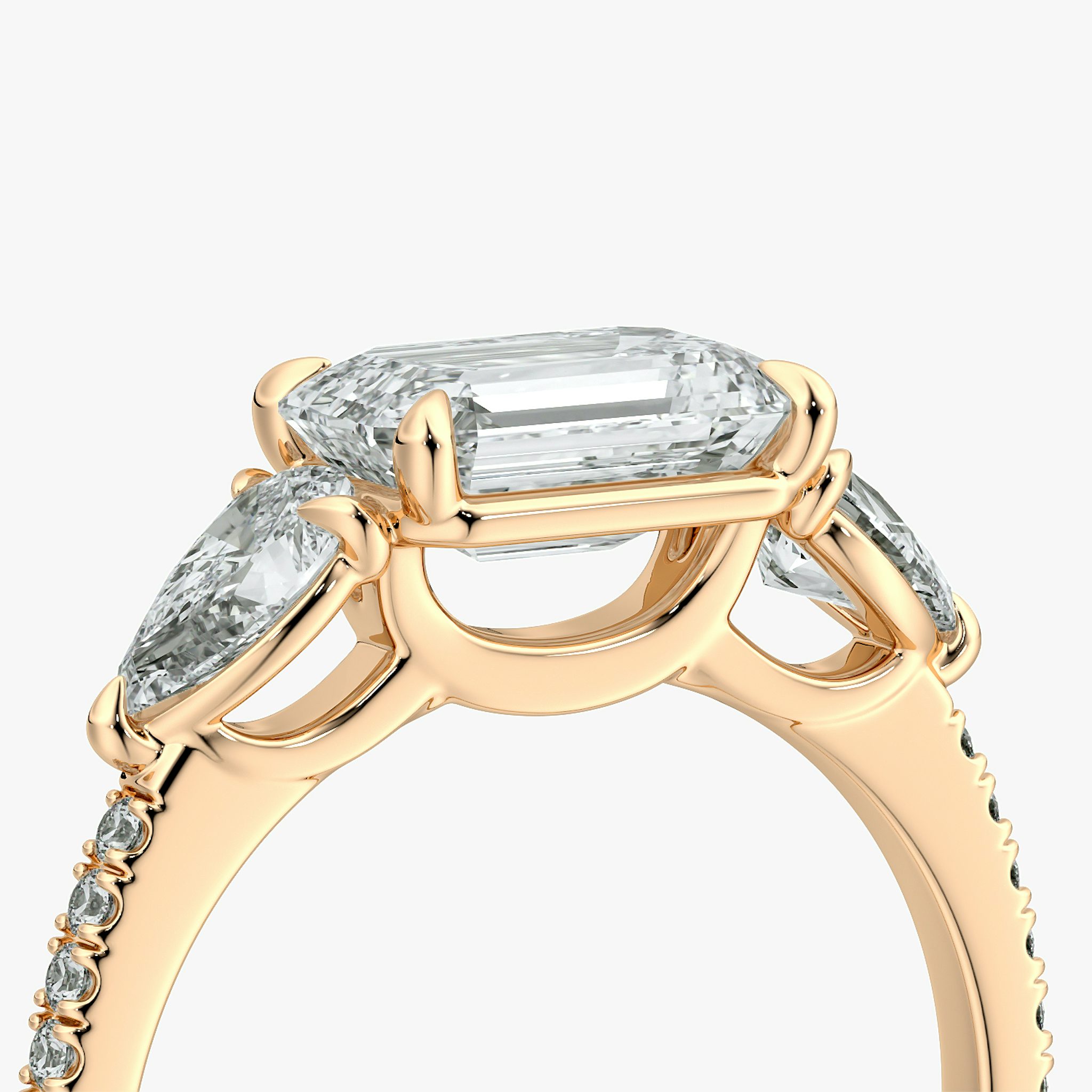 The Three Stone | Emerald | 14k | Rose Gold | bandAccent: Pavé | diamondOrientation: horizontal | sideStoneCarat: 0.25ct | sideStoneShape: Pear | caratWeight: other