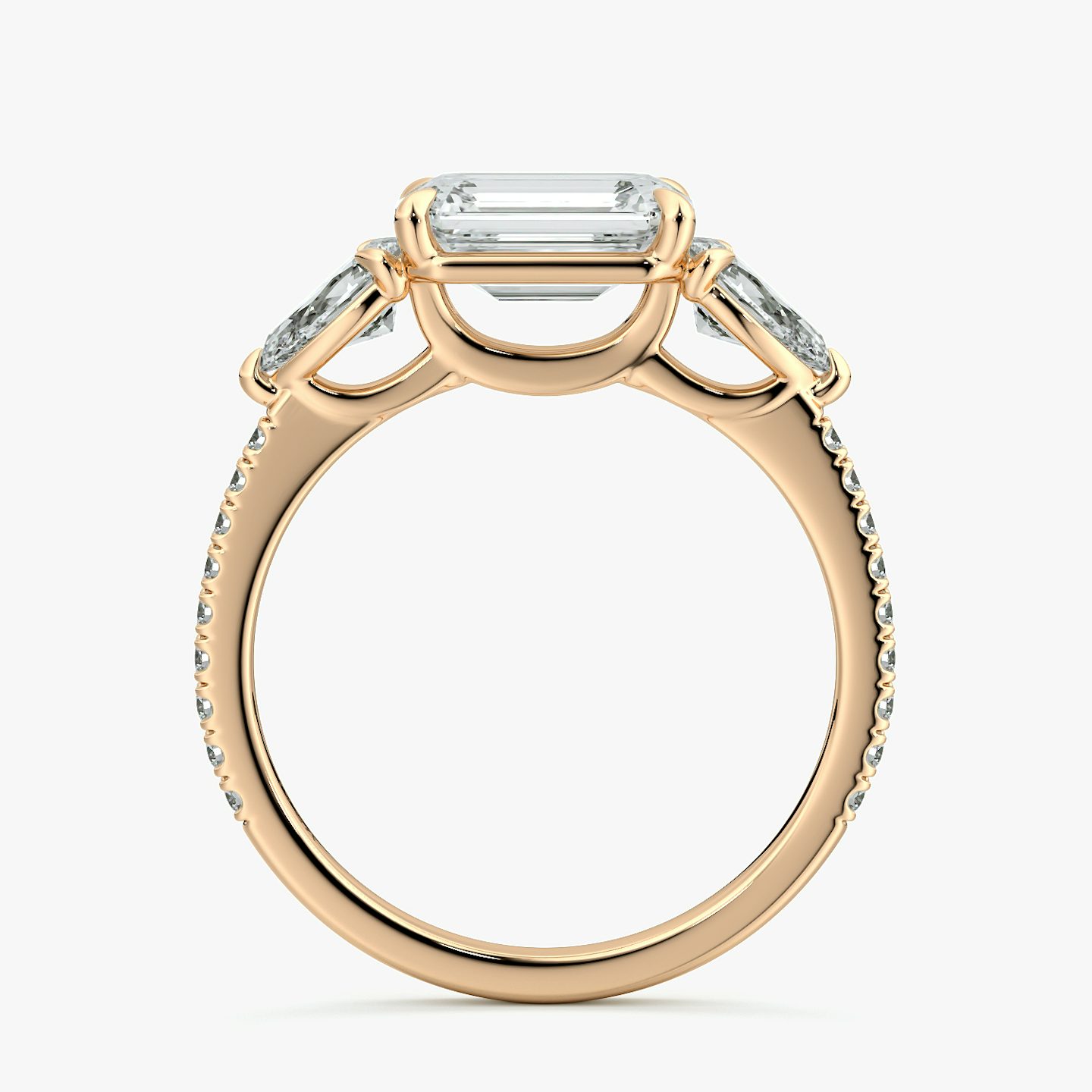 The Three Stone | Emerald | 14k | Rose Gold | bandAccent: Pavé | diamondOrientation: horizontal | sideStoneCarat: 0.25ct | sideStoneShape: Pear | caratWeight: other