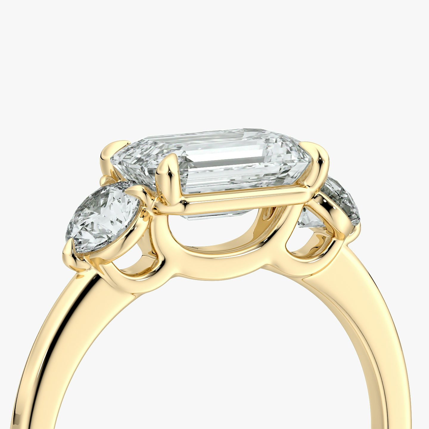 Three Stone | Emerald | 18k | Gelbgold | bandAccent: Ohne Pavé-Besatz | diamondOrientation: horizontal | sideStoneCarat: 0.25ct | sideStoneShape: Rund | caratWeight: other