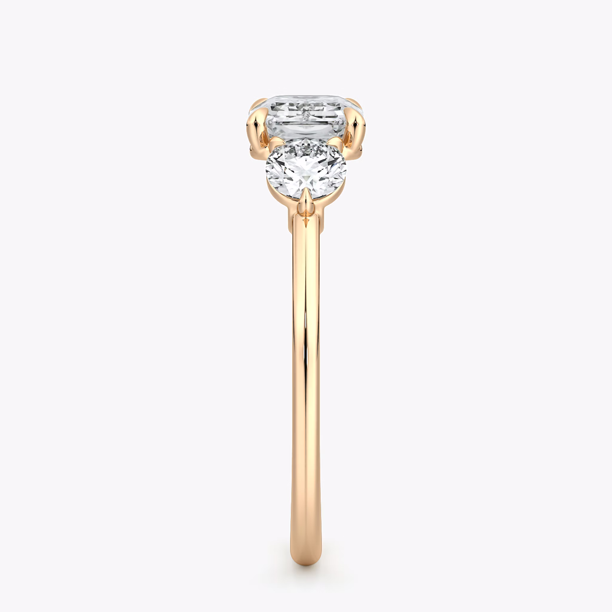 The Three Stone | Emerald | 14k | Rose Gold | bandAccent: Plain | diamondOrientation: horizontal | sideStoneCarat: 0.25ct | sideStoneShape: Round Brilliant | caratWeight: other