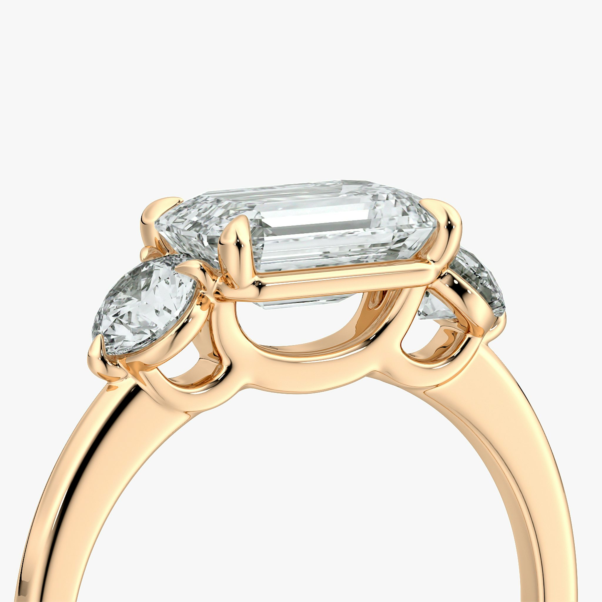 The Three Stone | Emerald | 14k | Rose Gold | bandAccent: Plain | diamondOrientation: horizontal | sideStoneCarat: 0.25ct | sideStoneShape: Round Brilliant | caratWeight: other