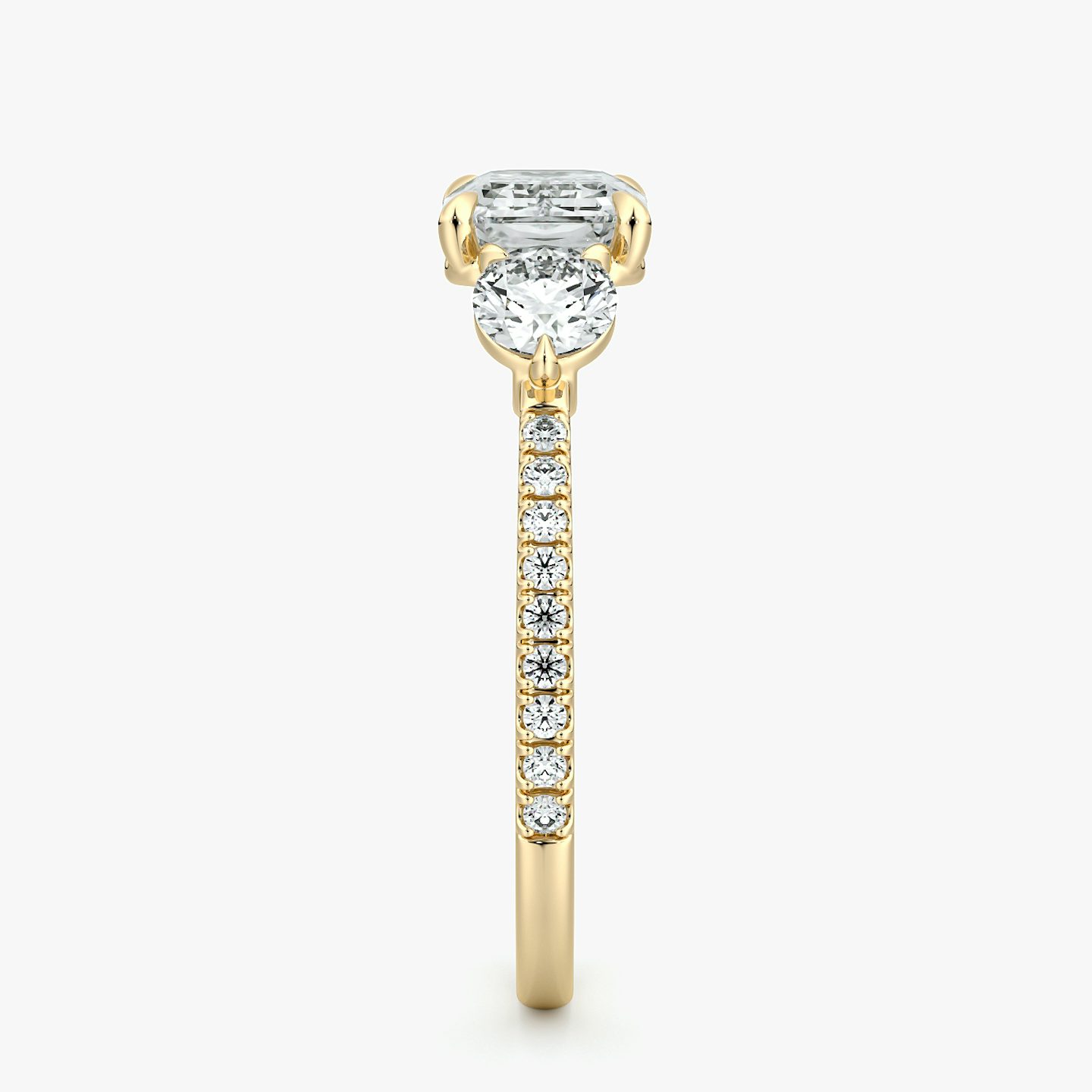 The Three Stone | Emerald | 18k | Yellow Gold | bandAccent: Pavé | diamondOrientation: horizontal | sideStoneCarat: 0.25ct | sideStoneShape: Round Brilliant | caratWeight: other