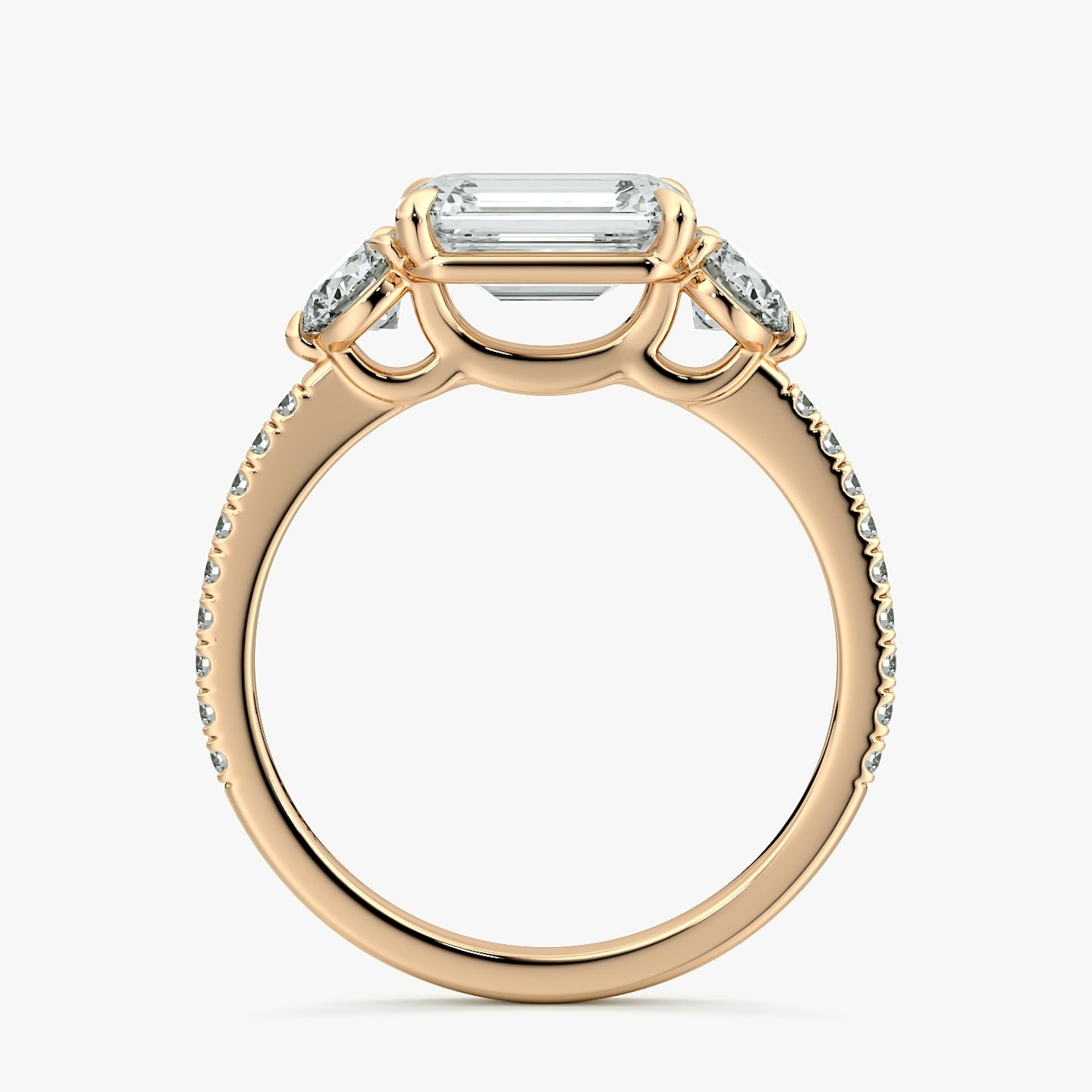 The Three Stone | Emerald | 14k | Rose Gold | bandAccent: Pavé | diamondOrientation: horizontal | sideStoneCarat: 0.25ct | sideStoneShape: Round Brilliant | caratWeight: other