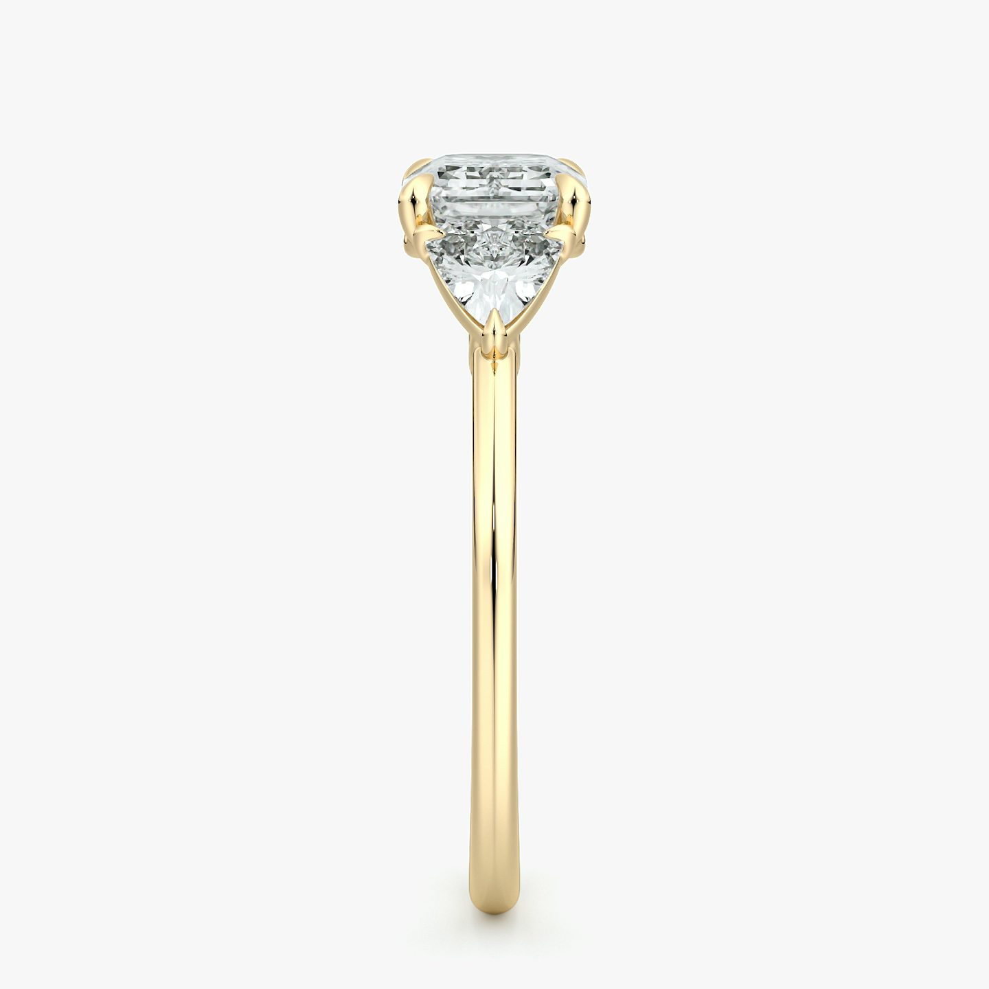 The Three Stone | Emerald | 18k | Yellow Gold | bandAccent: Plain | diamondOrientation: horizontal | sideStoneCarat: 0.25ct | sideStoneShape: Trillion | caratWeight: other