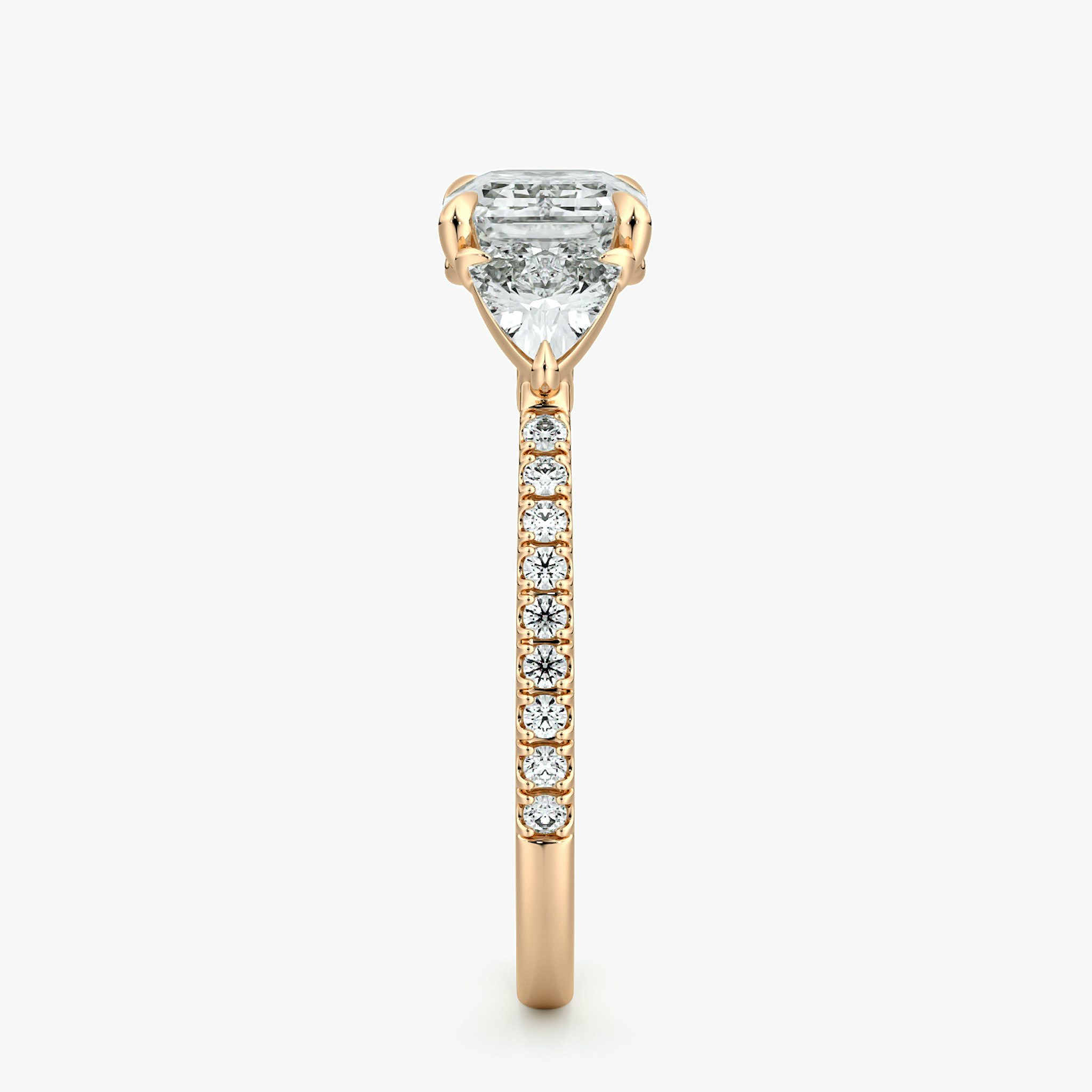 The Three Stone | Emerald | 14k | Rose Gold | bandAccent: Pavé | diamondOrientation: horizontal | sideStoneCarat: 0.25ct | sideStoneShape: Trillion | caratWeight: other