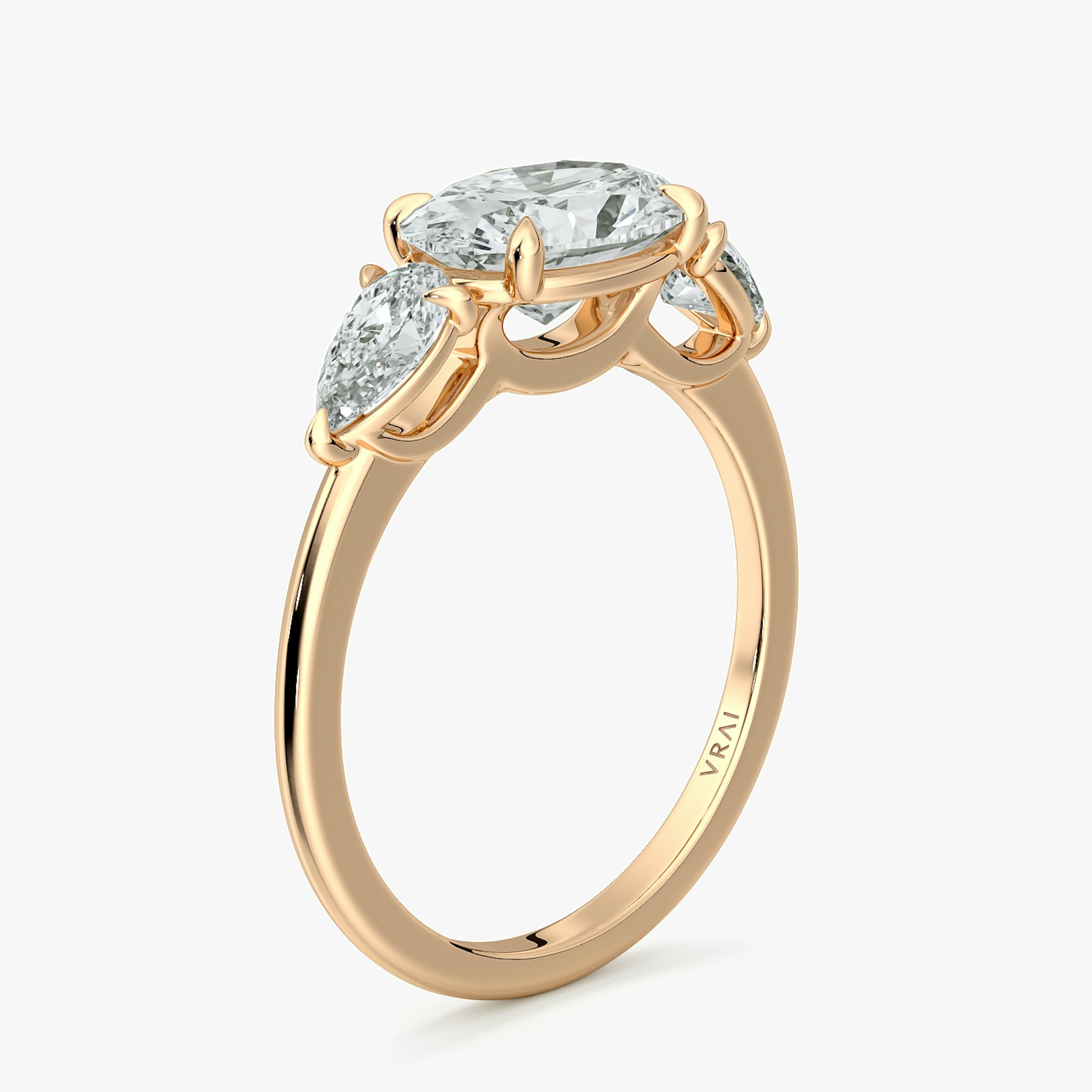 The Three Stone | Oval | 14k | Rose Gold | bandAccent: Plain | diamondOrientation: horizontal | sideStoneCarat: 0.25ct | sideStoneShape: Pear | caratWeight: other