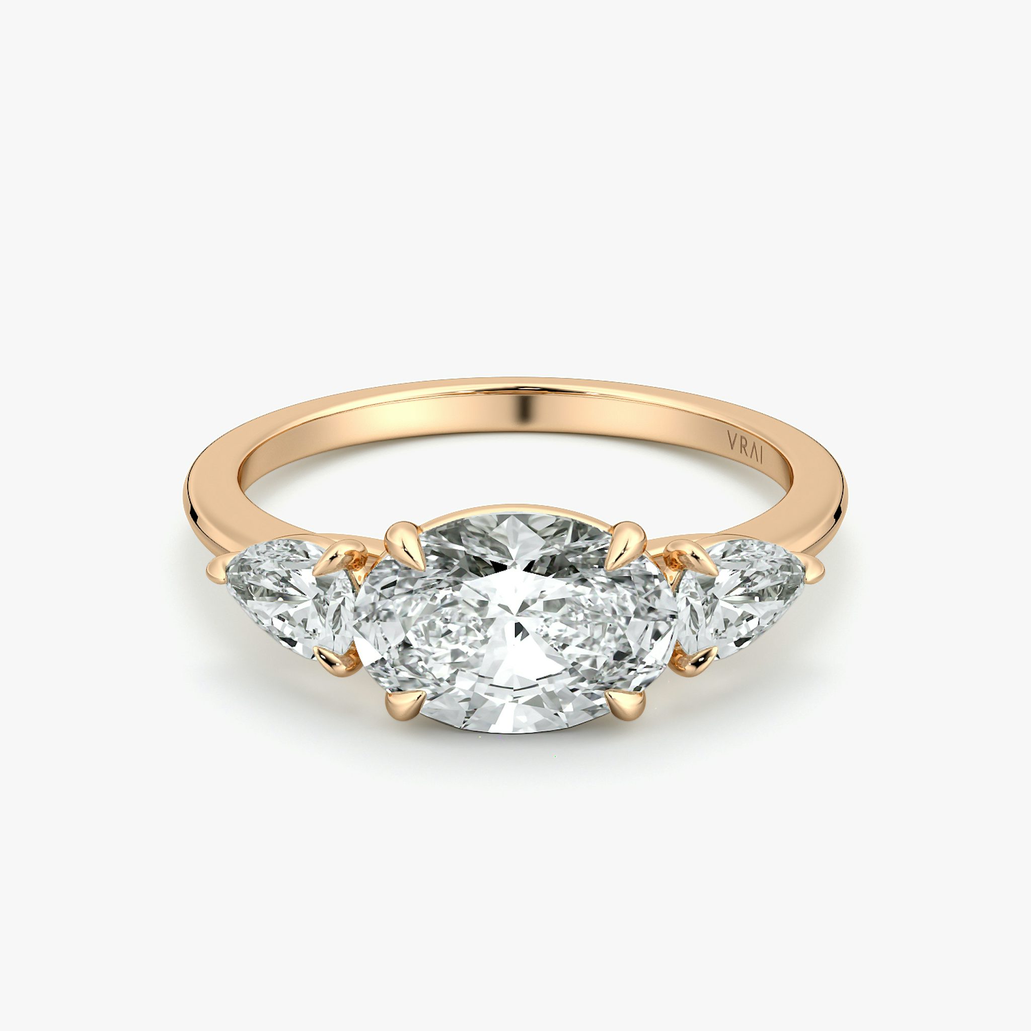 The Three Stone | Oval | 14k | Rose Gold | bandAccent: Plain | diamondOrientation: horizontal | sideStoneCarat: 0.25ct | sideStoneShape: Pear | caratWeight: other