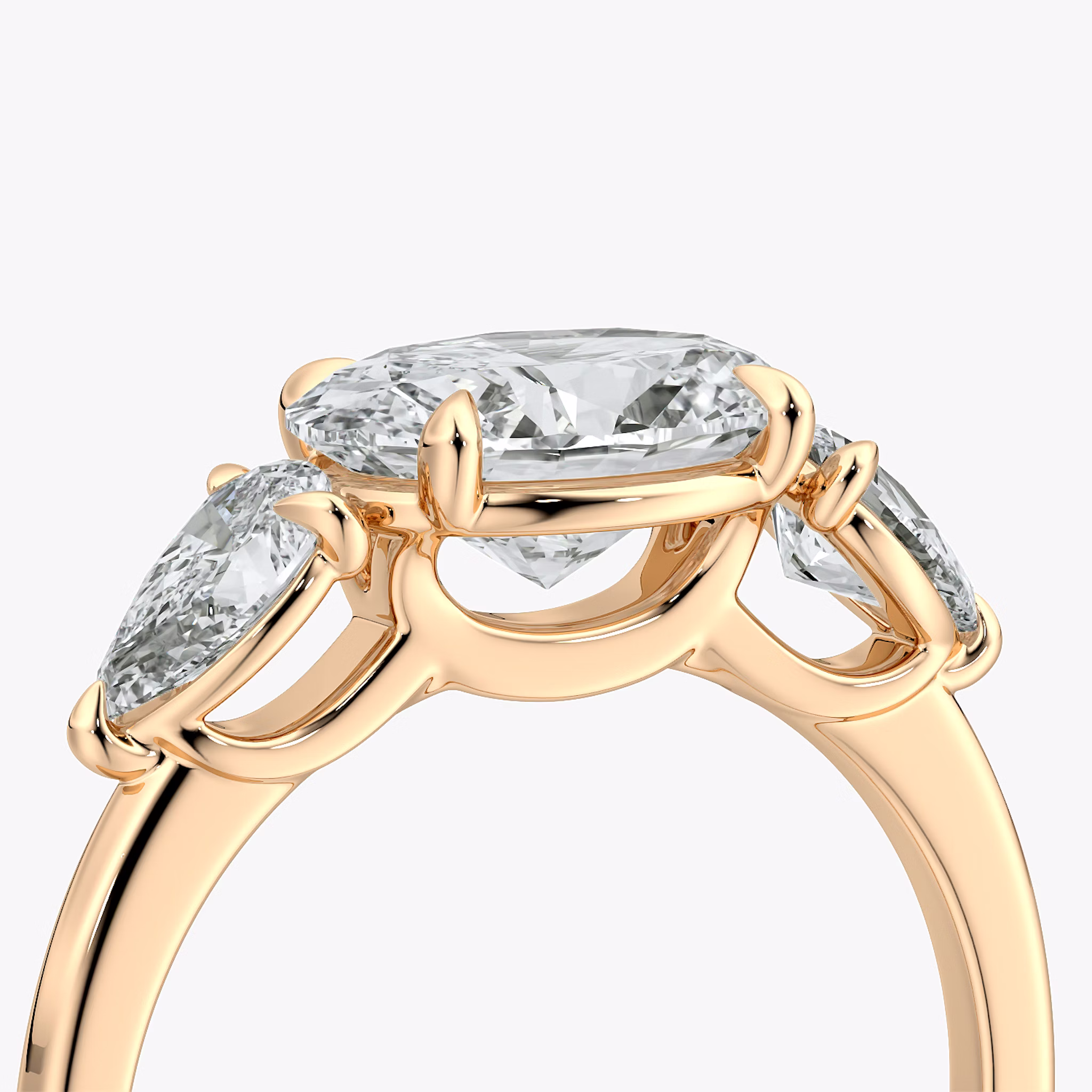 The Three Stone | Oval | 14k | Rose Gold | bandAccent: Plain | diamondOrientation: horizontal | sideStoneCarat: 0.25ct | sideStoneShape: Pear | caratWeight: other