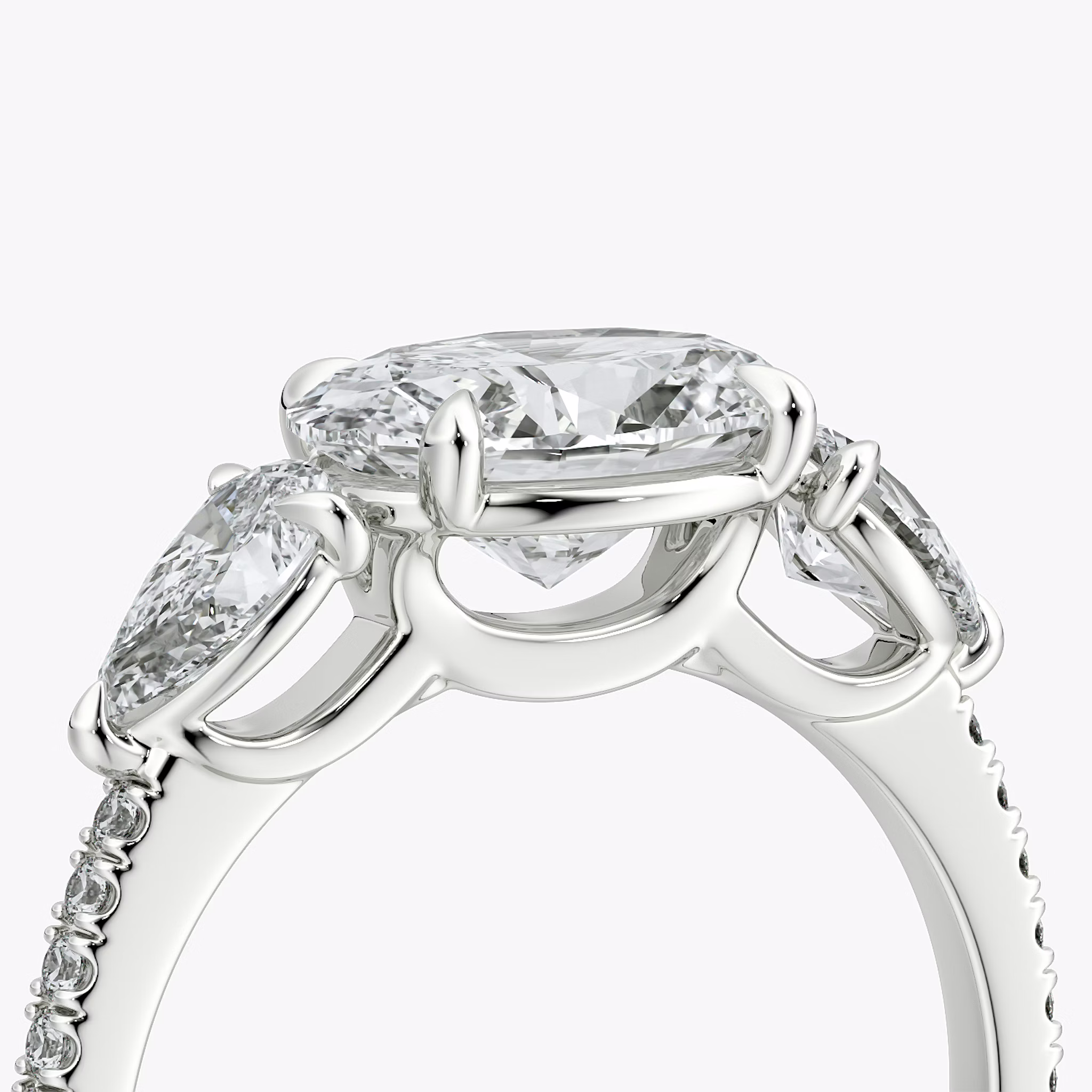 The Three Stone | Oval | 18k | White Gold | bandAccent: Pavé | diamondOrientation: horizontal | sideStoneCarat: 0.25ct | sideStoneShape: Pear | caratWeight: other