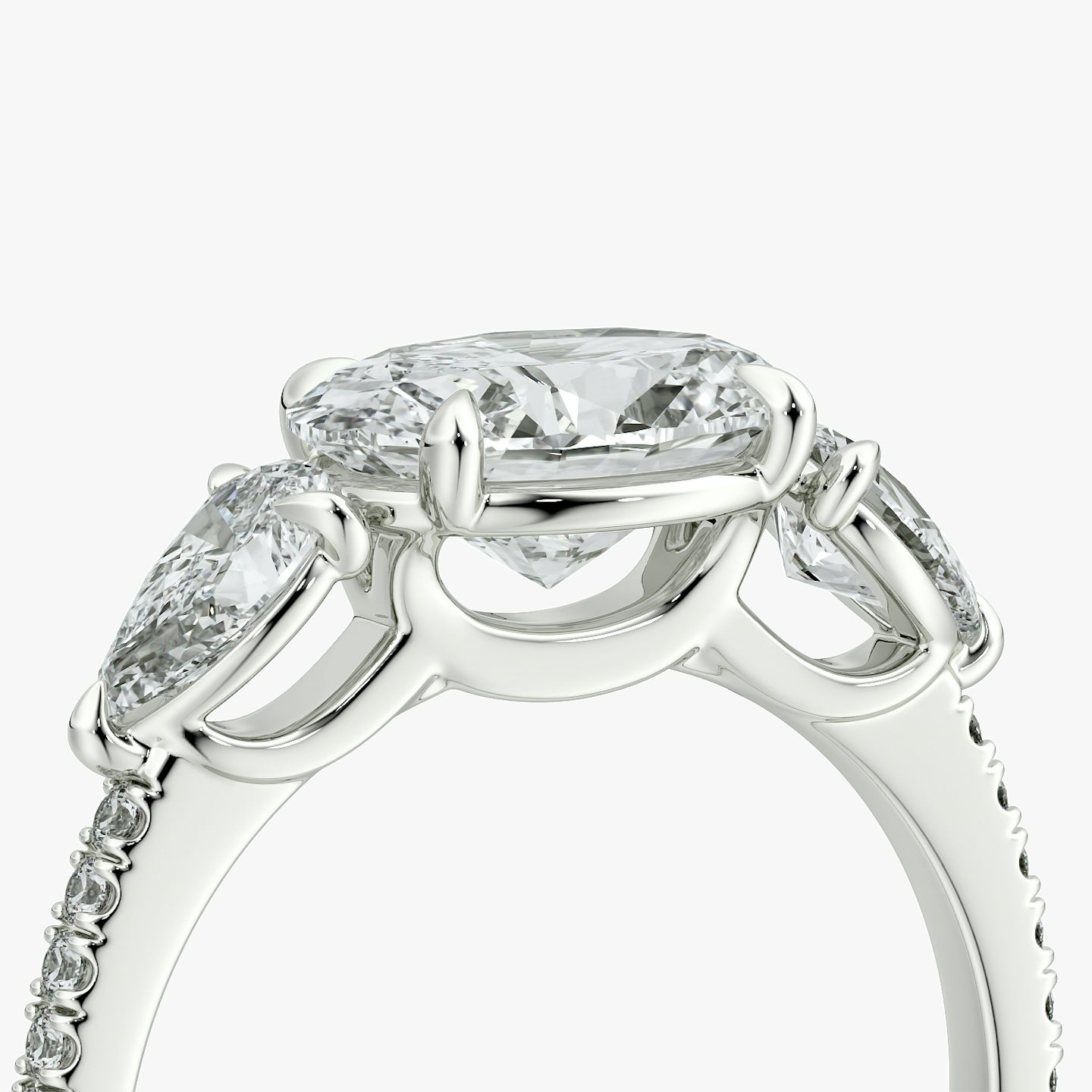 The Three Stone | Oval | Platinum | bandAccent: Pavé | diamondOrientation: horizontal | sideStoneCarat: 0.25ct | sideStoneShape: Pear | caratWeight: other
