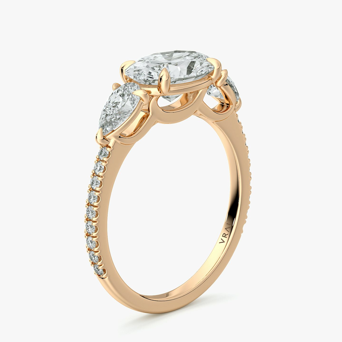 The Three Stone | Oval | 14k | Rose Gold | bandAccent: Pavé | diamondOrientation: horizontal | sideStoneCarat: 0.25ct | sideStoneShape: Pear | caratWeight: other