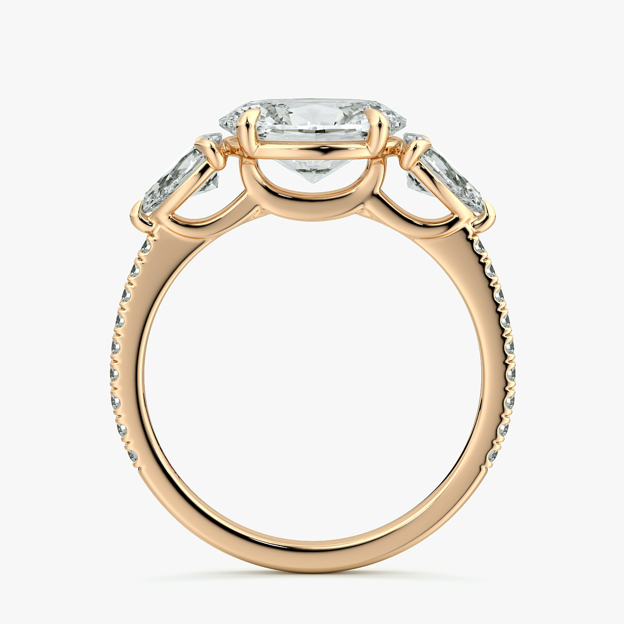 The Three Stone | Oval | 14k | Rose Gold | bandAccent: Pavé | diamondOrientation: horizontal | sideStoneCarat: 0.25ct | sideStoneShape: Pear | caratWeight: other