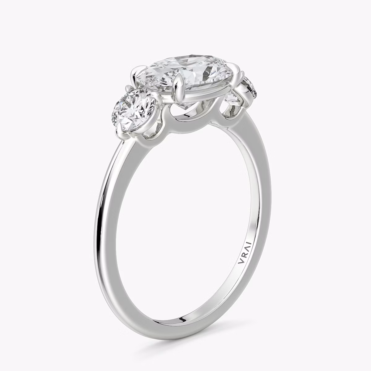 The Three Stone | Oval | Platinum | bandAccent: Plain | diamondOrientation: horizontal | sideStoneCarat: 0.25ct | sideStoneShape: Round Brilliant | caratWeight: other