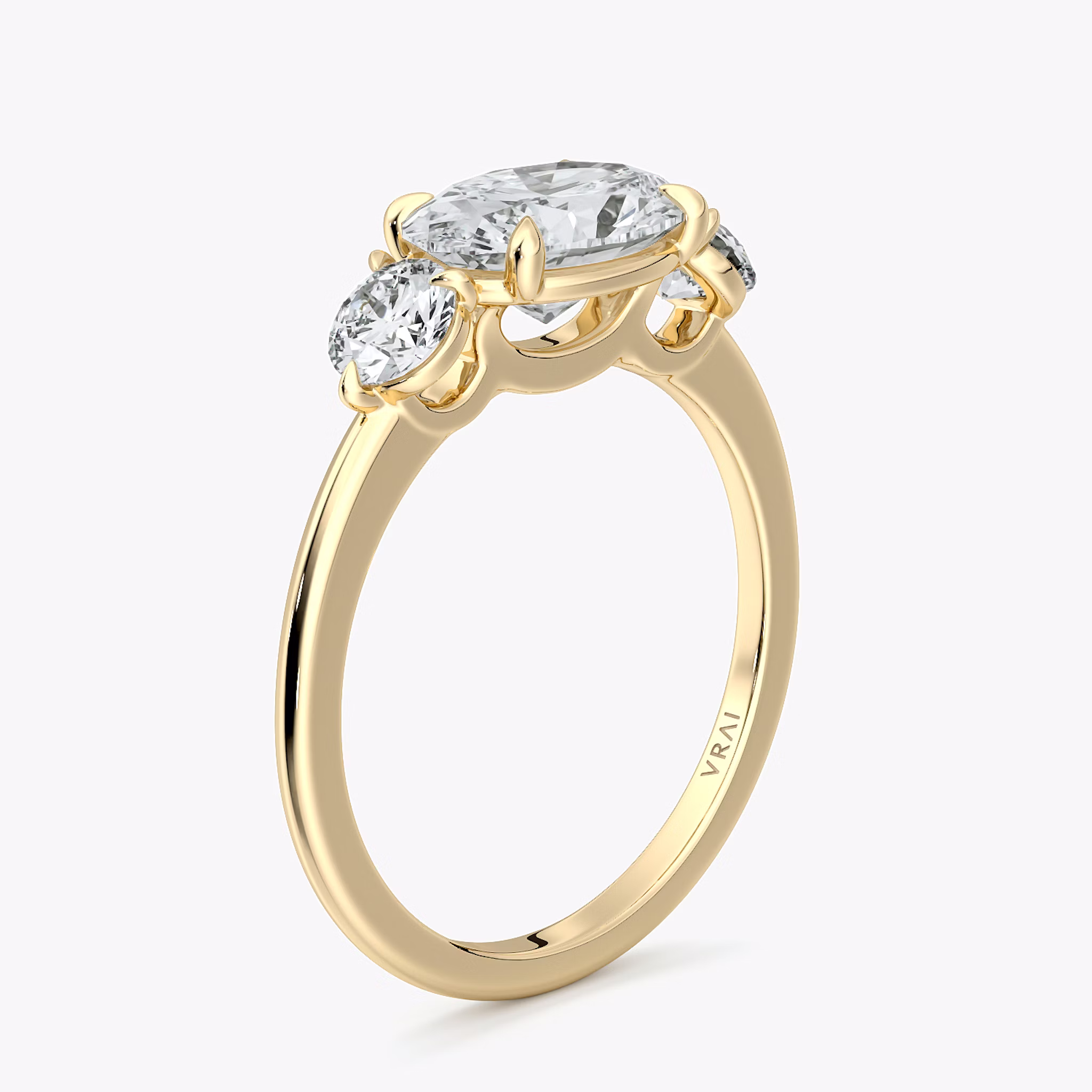 The Three Stone | Oval | 18k | Yellow Gold | bandAccent: Plain | diamondOrientation: horizontal | sideStoneCarat: 0.25ct | sideStoneShape: Round Brilliant | caratWeight: other