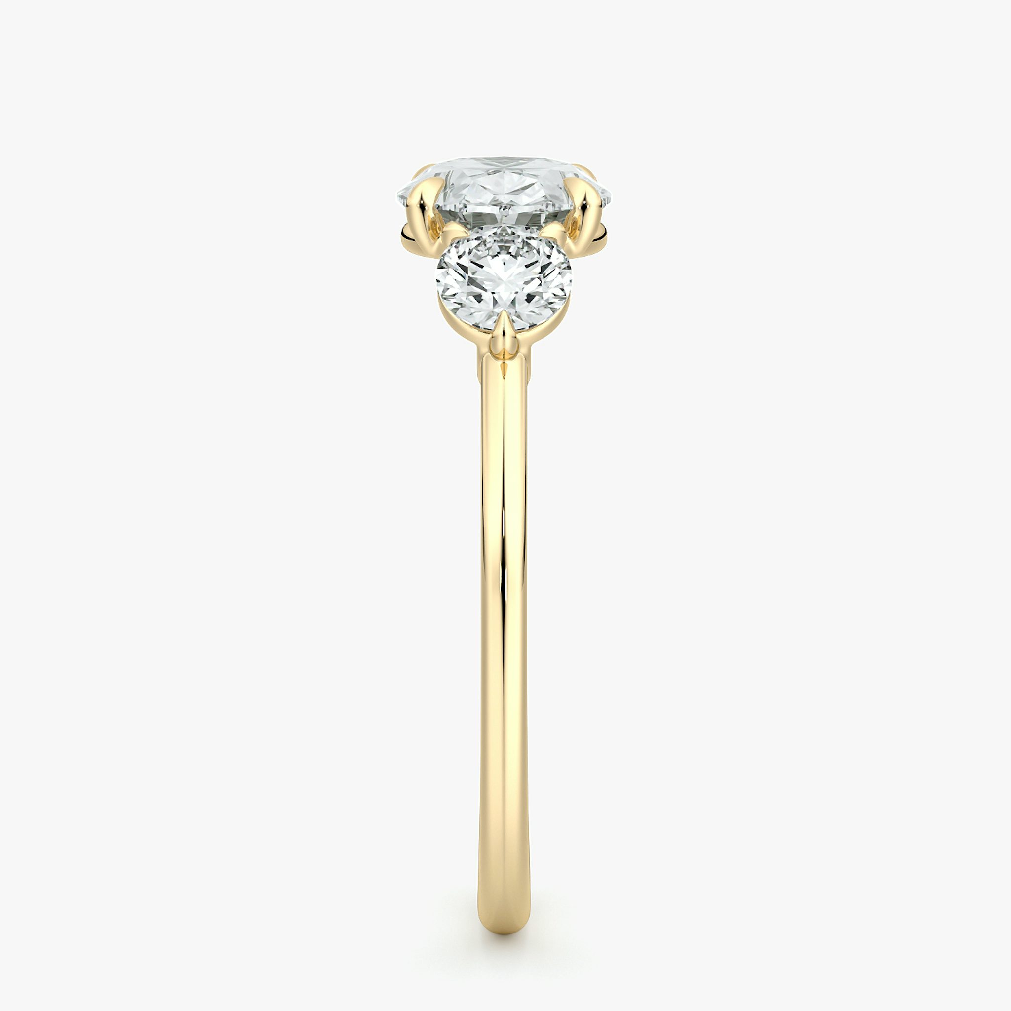 The Three Stone | Oval | 18k | Yellow Gold | bandAccent: Plain | diamondOrientation: horizontal | sideStoneCarat: 0.25ct | sideStoneShape: Round Brilliant | caratWeight: other