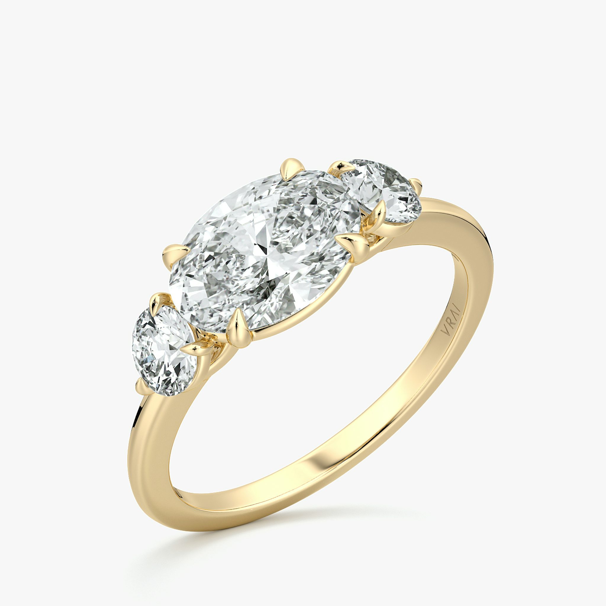 The Three Stone | Oval | 18k | Yellow Gold | bandAccent: Plain | diamondOrientation: horizontal | sideStoneCarat: 0.25ct | sideStoneShape: Round Brilliant | caratWeight: other
