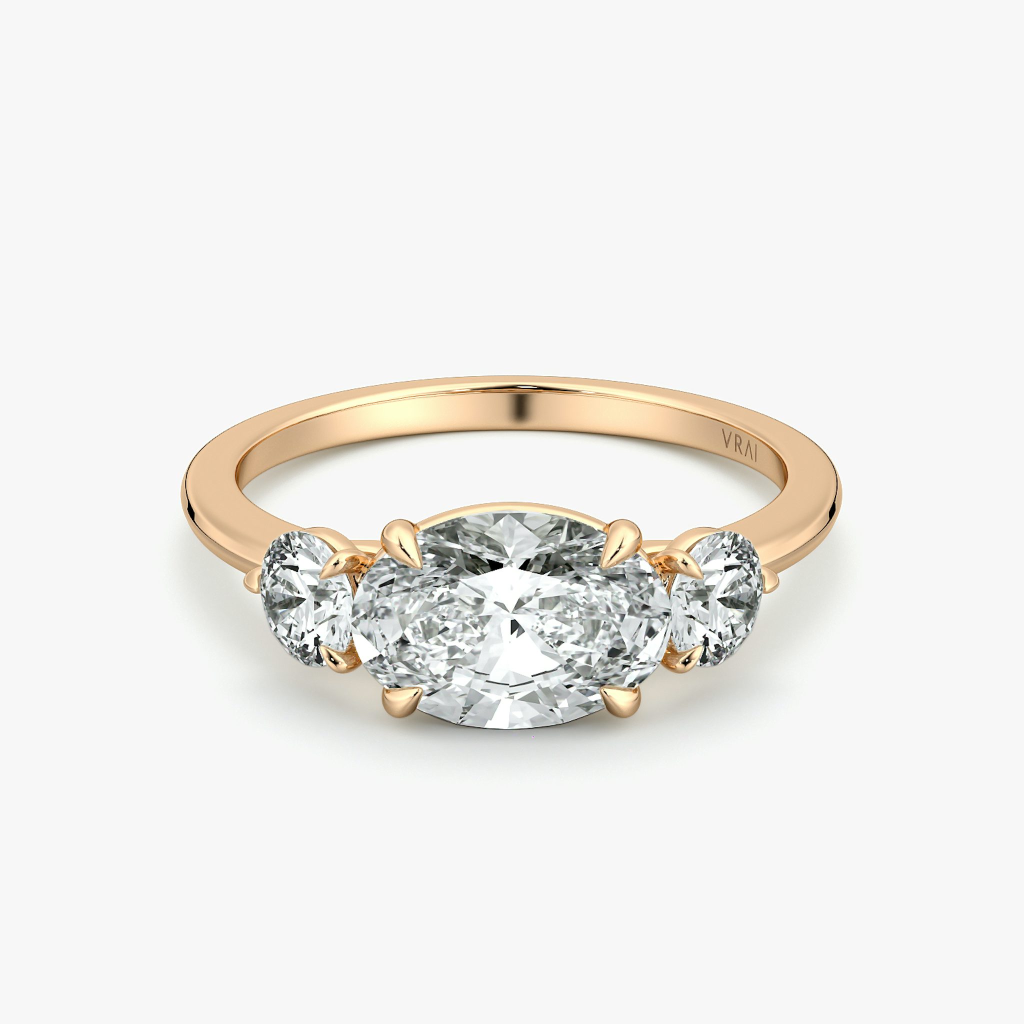 The Three Stone | Oval | 14k | Rose Gold | bandAccent: Plain | diamondOrientation: horizontal | sideStoneCarat: 0.25ct | sideStoneShape: Round Brilliant | caratWeight: other