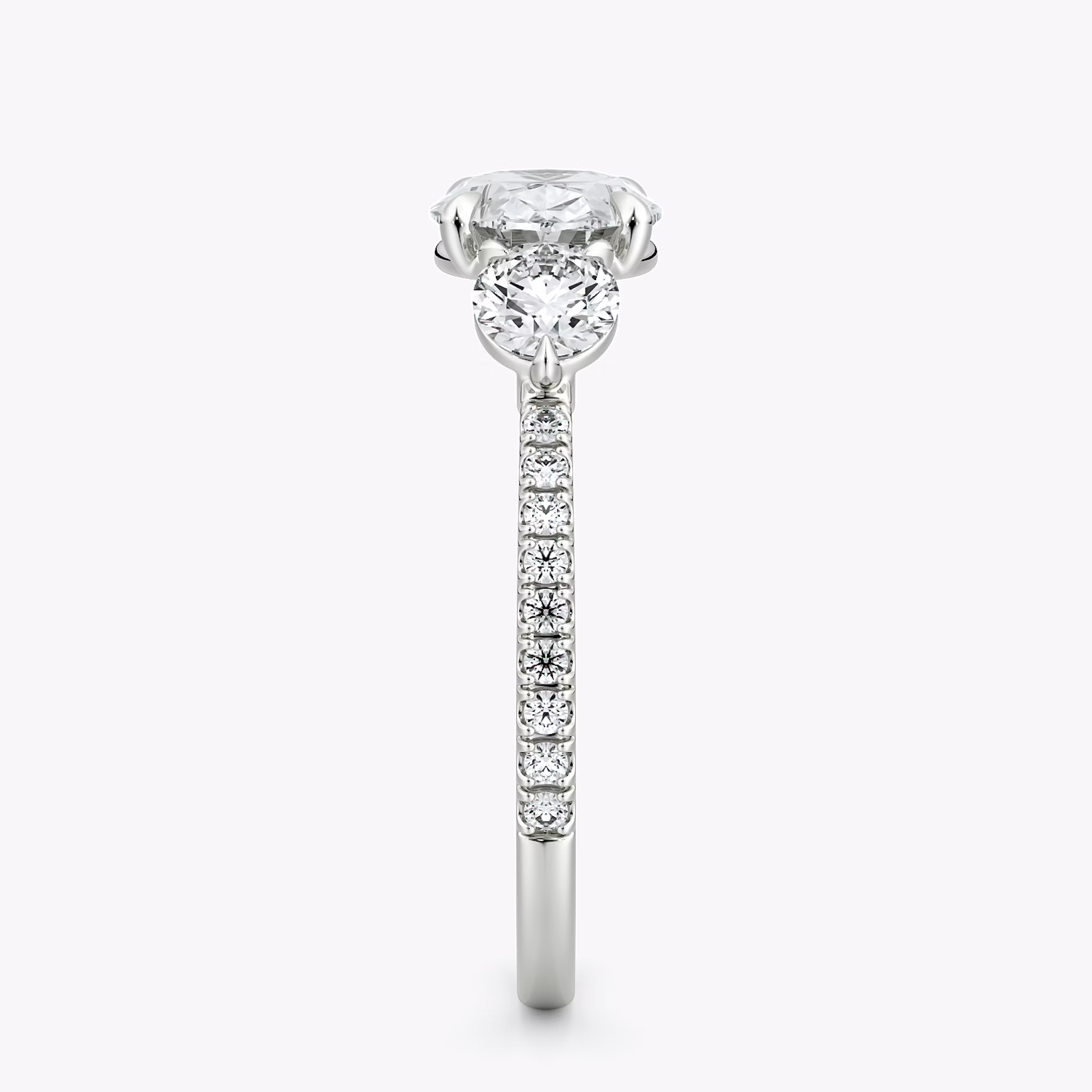 The Three Stone | Oval | 18k | White Gold | bandAccent: Pavé | diamondOrientation: horizontal | sideStoneCarat: 0.25ct | sideStoneShape: Round Brilliant | caratWeight: other