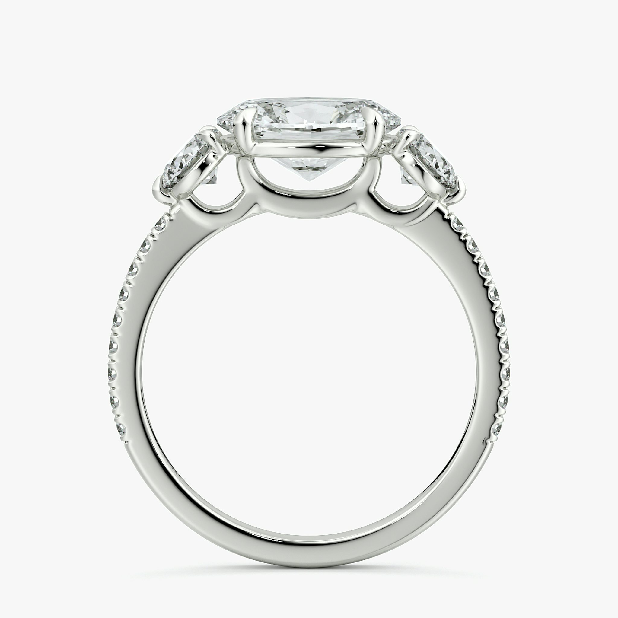 The Three Stone | Oval | 18k | White Gold | bandAccent: Pavé | diamondOrientation: horizontal | sideStoneCarat: 0.25ct | sideStoneShape: Round Brilliant | caratWeight: other